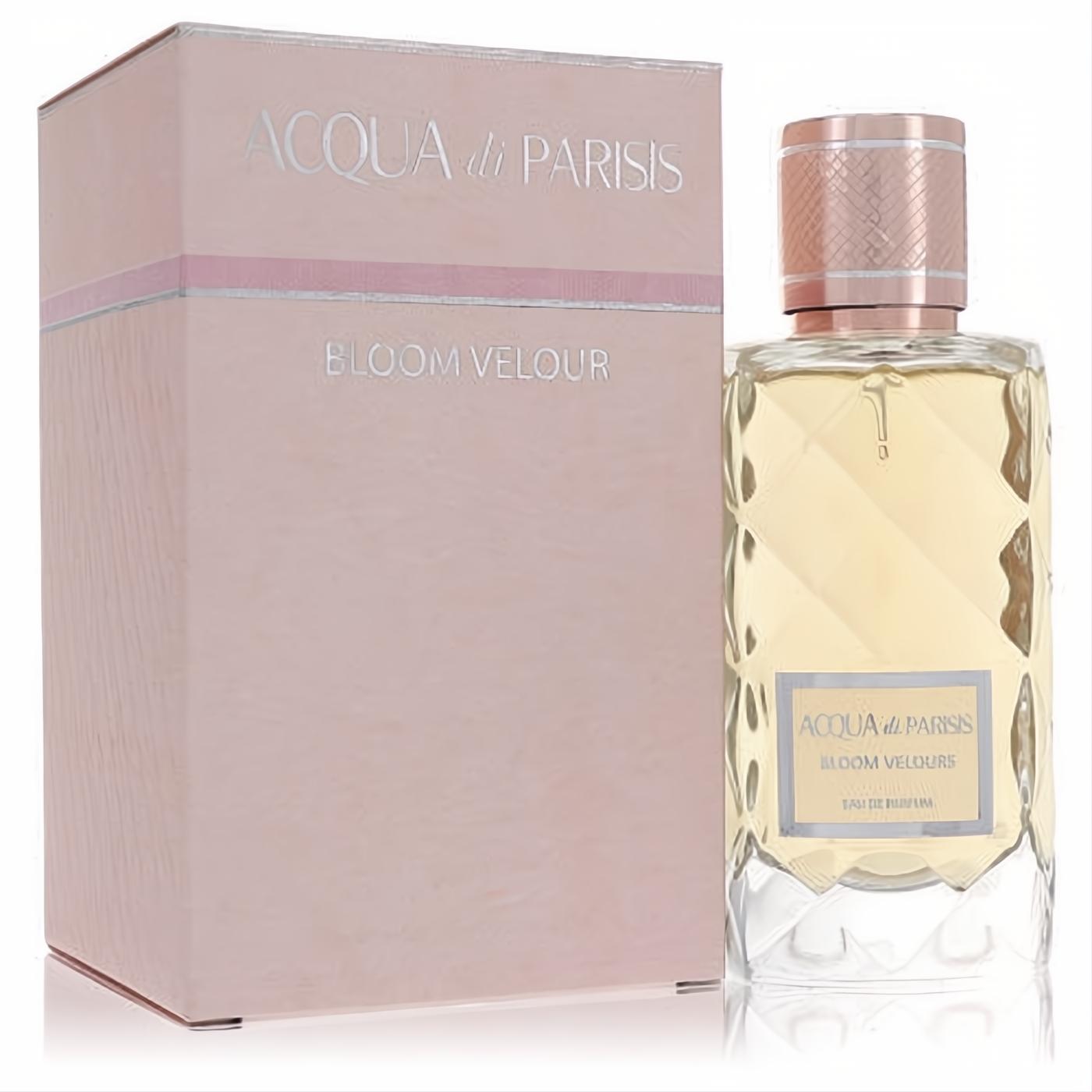 Acqua Di Parisis Bloom Velour 3.3 oz women's fragrance. Faceted glass bottle, golden liquid, rose gold cap, and blush pink box.