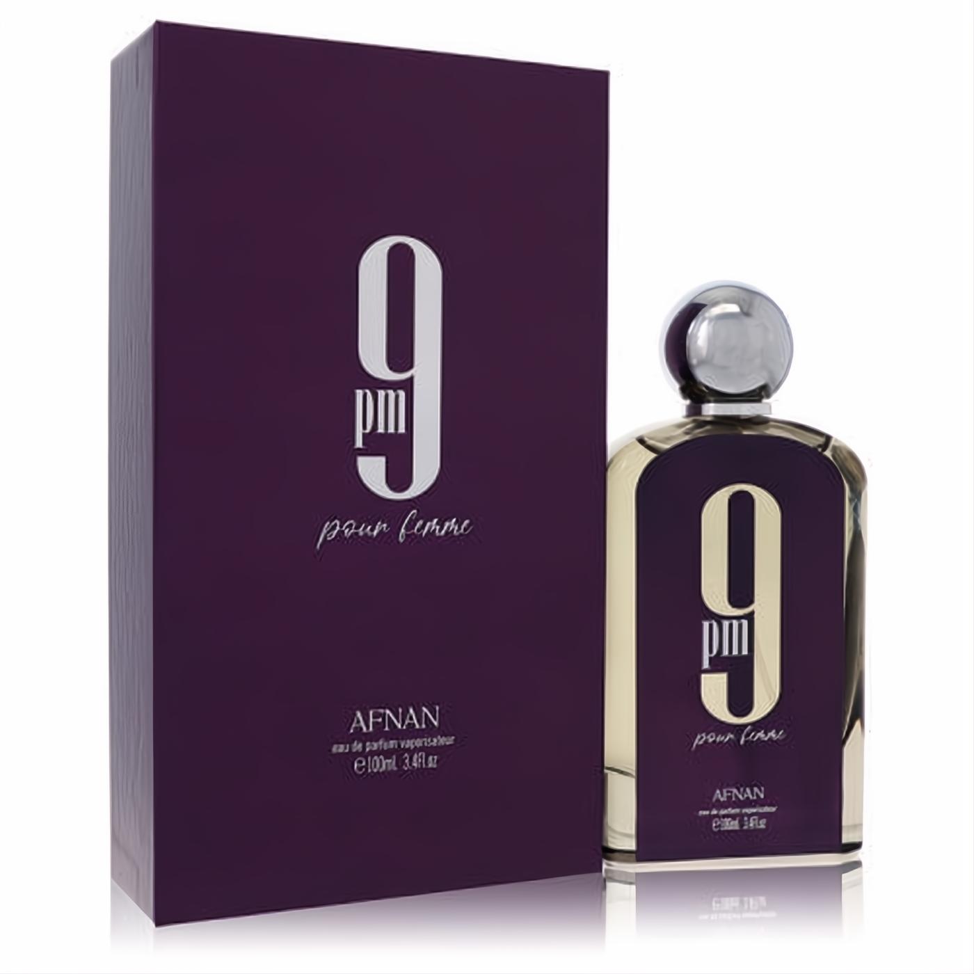 Sophisticated Afnan 9pm Pour Femme 3.4 oz EDP. Deep purple bottle with striking gold "9 pm" design, silver cap, and matching elegant box.