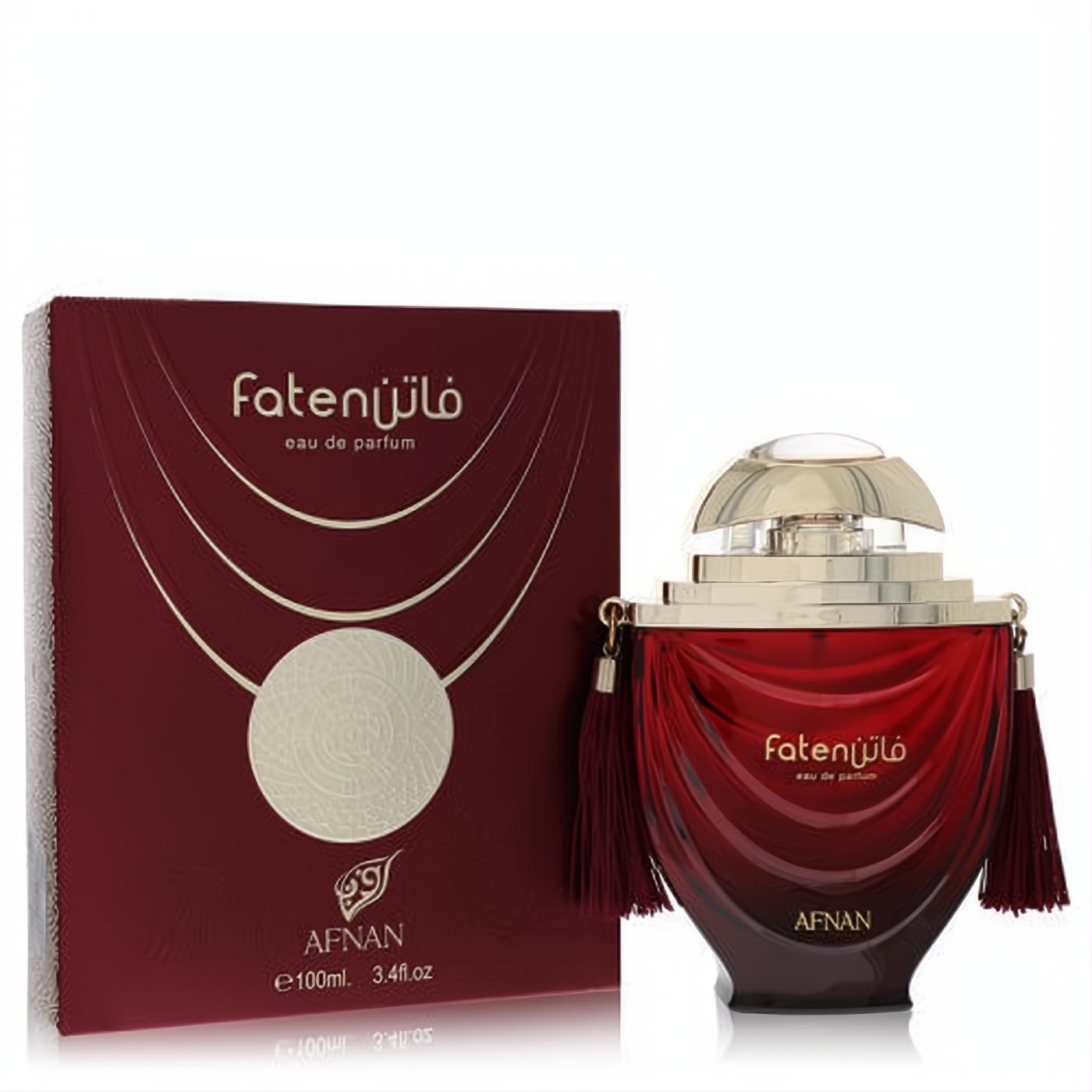 Captivating Afnan Faten Maroon 3.4 oz unisex eau de parfum. Rich maroon bottle, ornate gold cap, and elegant tassels.