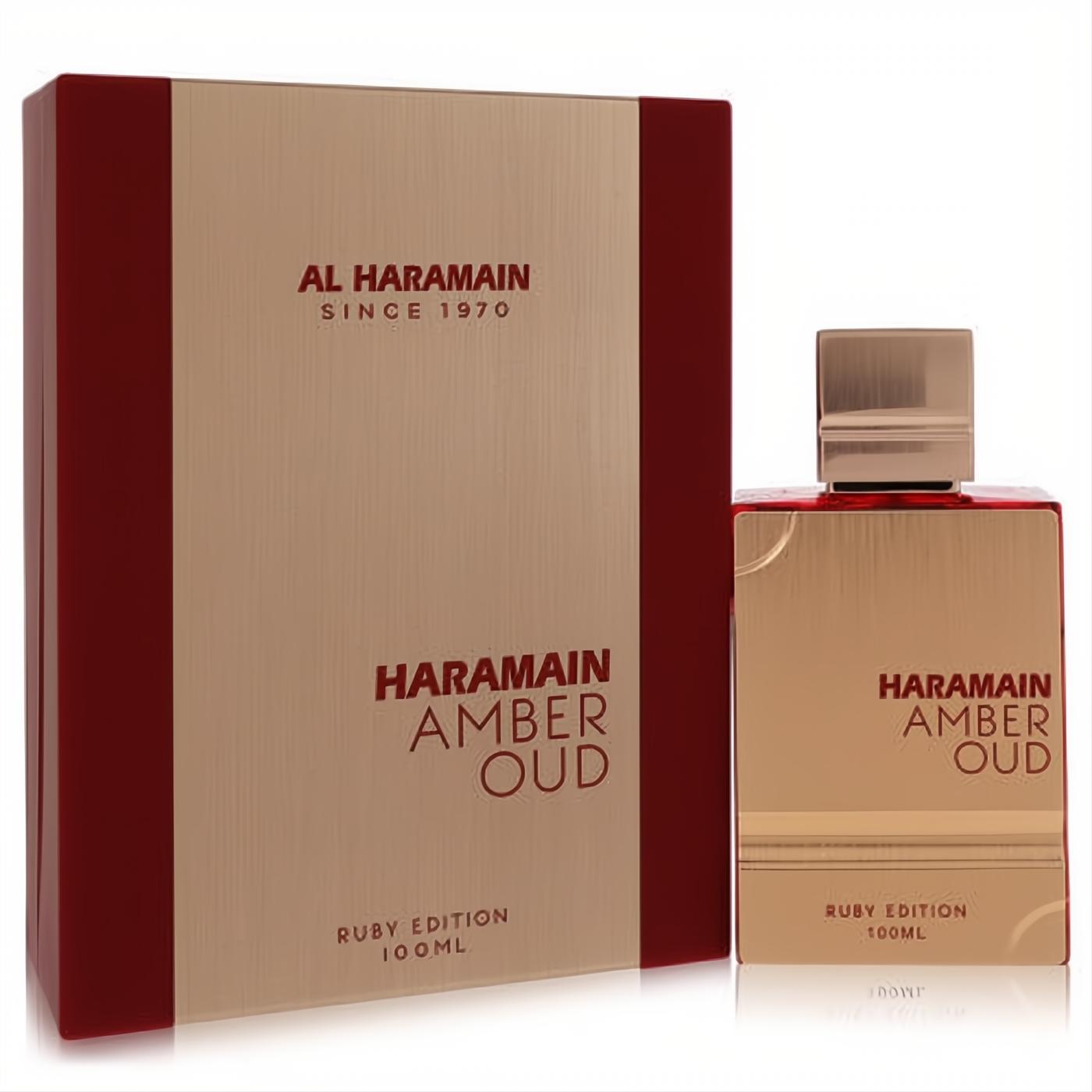 Exquisite Al Haramain Amber Oud Ruby 100ml EDP. Sleek red glass bottle with a metallic gold cap and its elegant gold and ruby red box.
