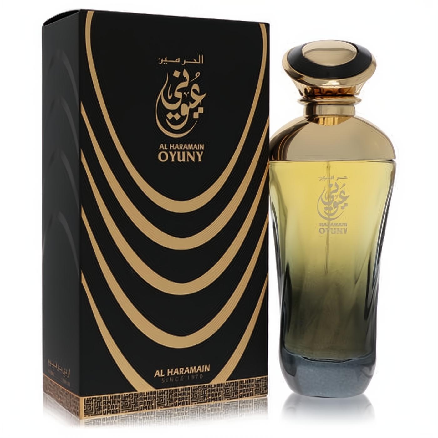 Experience Al Haramain Oyuny 3.3 oz unisex EDP. Stunning gold-to-dark gradient bottle, ornate cap, and matching black-gold patterned box.