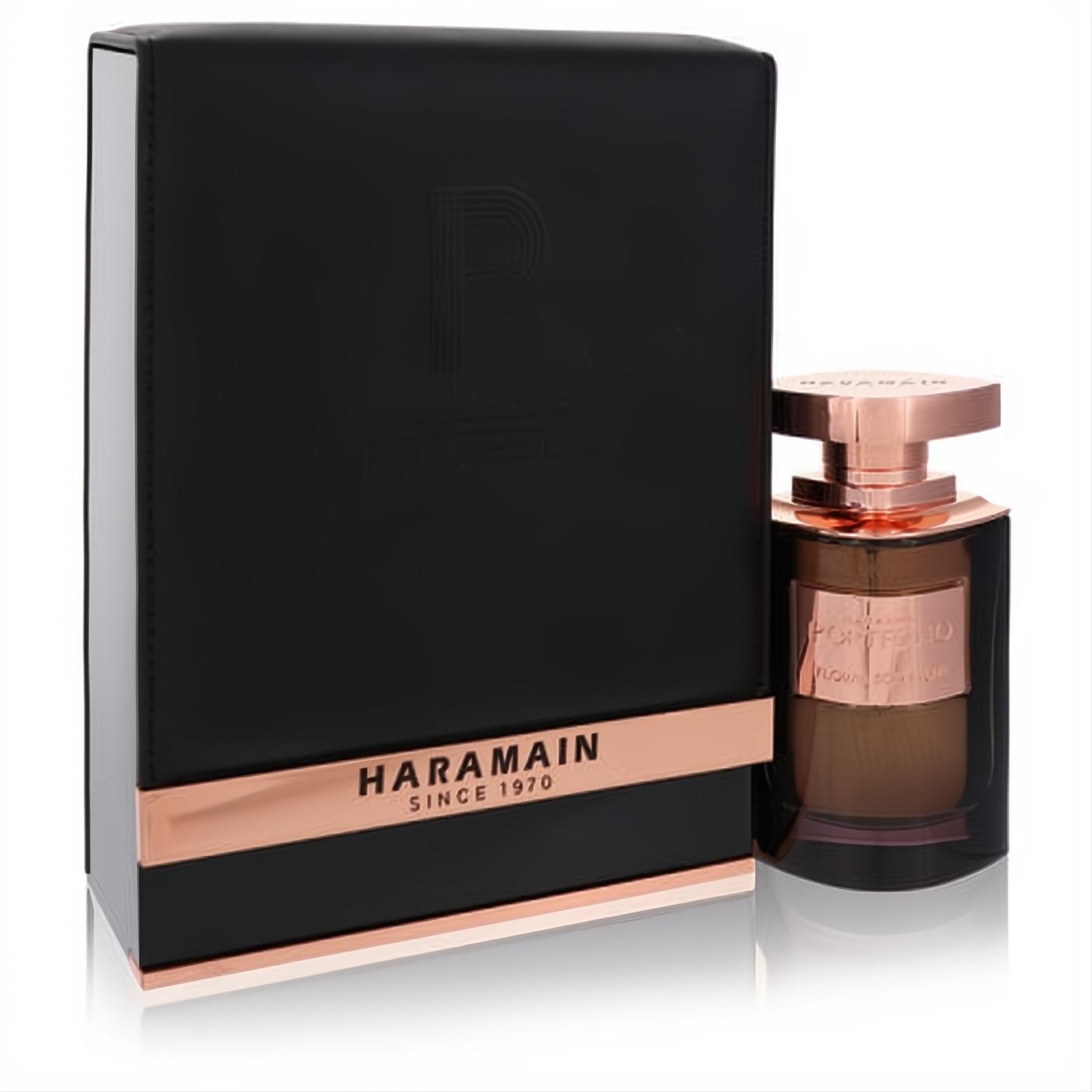 Al Haramain Portfolio Floral Sculpture 2.5 oz EDP. Elegant black box with rose gold "HARAMAIN" band, sleek amber glass bottle.
