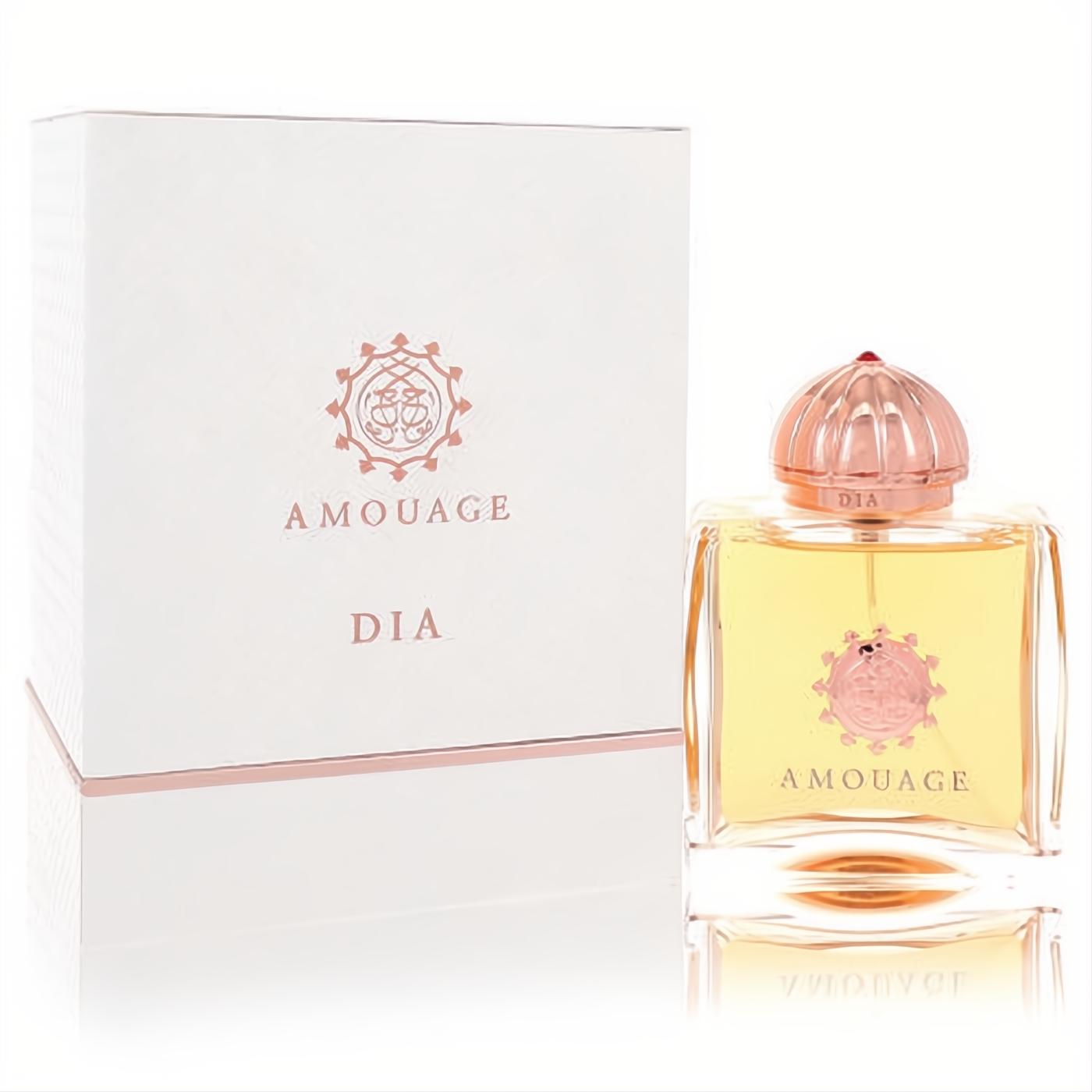 Amouage Dia 3.4 oz EDP for women. Golden liquid in a clear bottle with a rose gold ribbed cap, next to its elegant white box.
