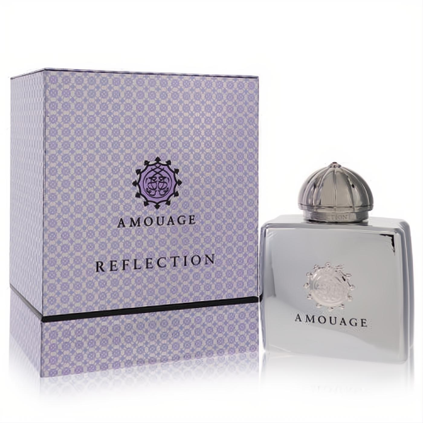 Experience Amouage Reflection 3.4 oz women's perfume. Sleek silver bottle, unique dome cap, and elegant purple patterned box.