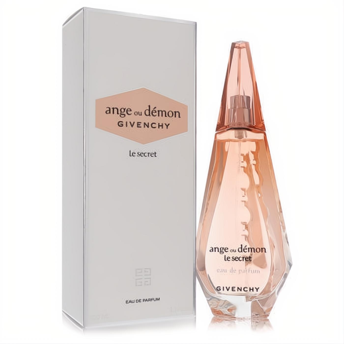 Givenchy Ange Ou Demon Le Secret 3.4 oz EDP. Elegant faceted clear bottle with peach-pink liquid and cap, next to its chic white box.