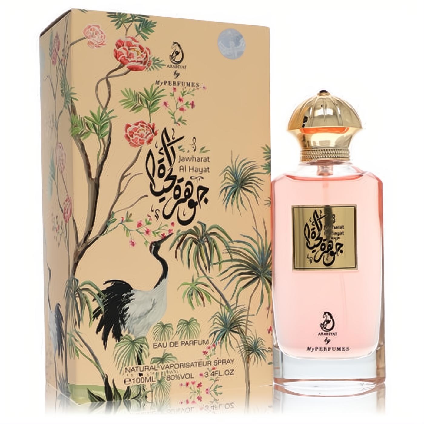 Arabiyat Jawharat Al Hayat 3.4 oz unisex EDP. Pink perfume in a gold-capped bottle, with an elegant beige box featuring a crane and floral design.