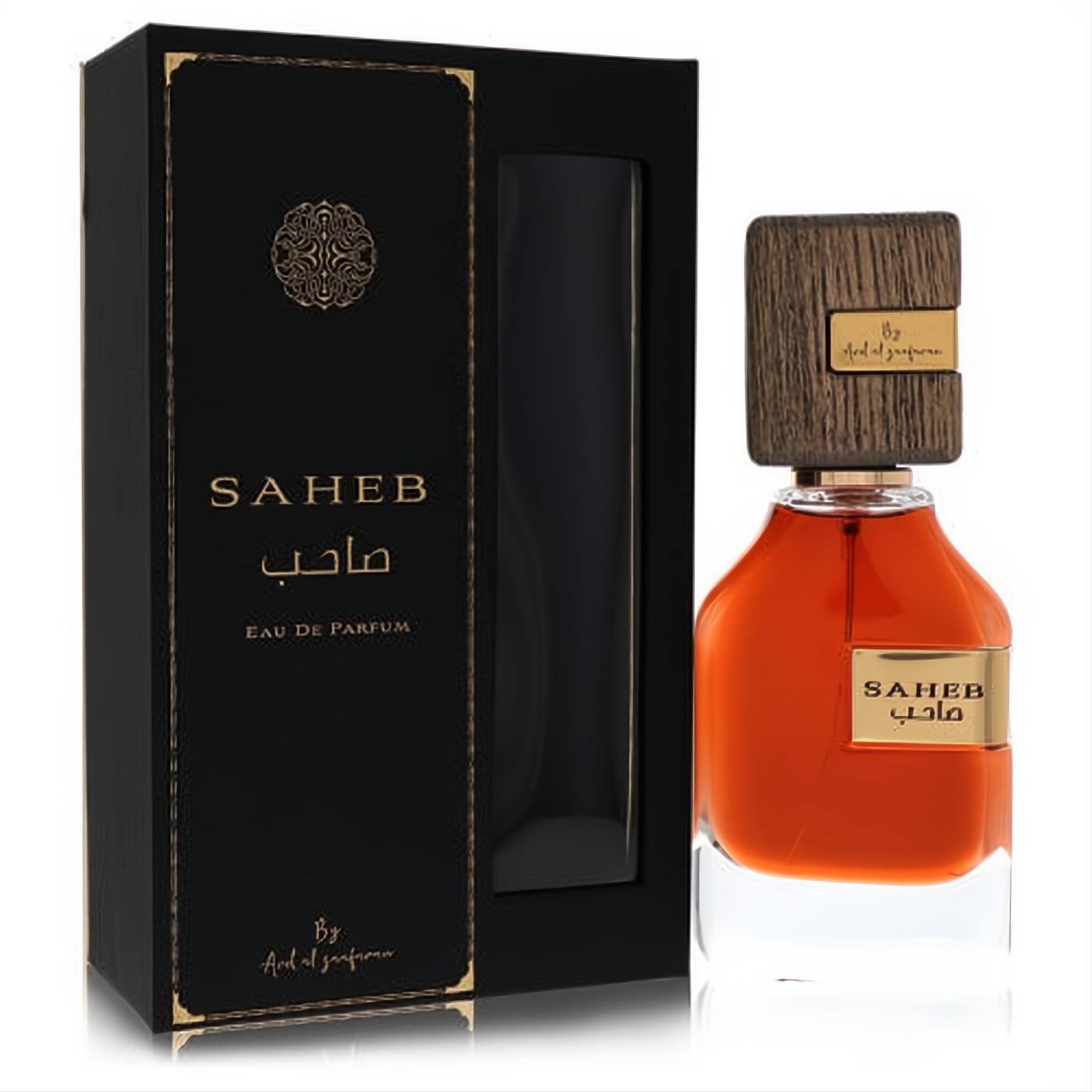 Ard Al Zaafaran Saheb fragrance: amber liquid in clear bottle with gold label, wood-grain cap, and luxurious black & gold box.
