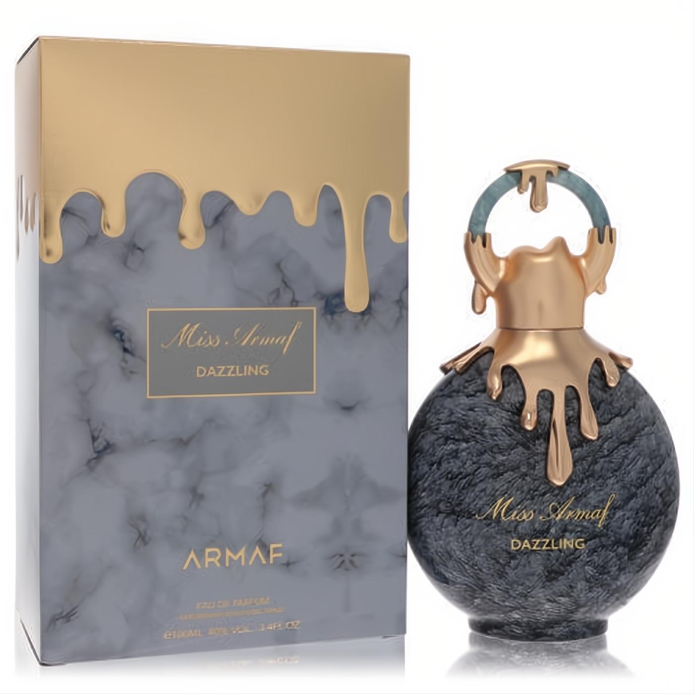 Dazzling Armaf Miss Dazzling 3.4 oz EDP in a unique grey marble bottle with luxurious gold drip accents and a chic teal handle.