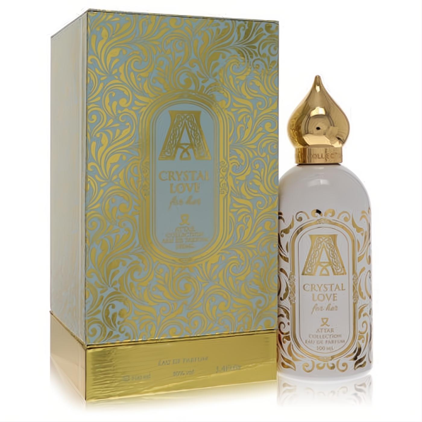 Attar Crystal Love 3.4 oz EDP. White bottle with exquisite gold filigree, unique golden cap, and matching ornate blue-gold box.