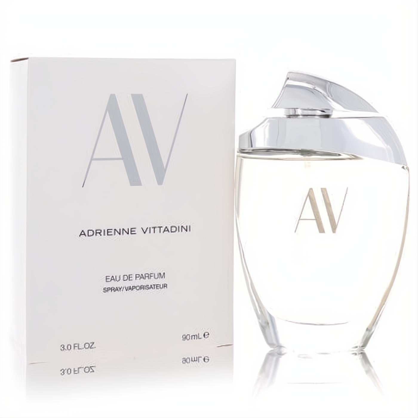Av by Adrienne Vittadini 3 oz Eau De Parfum. Elegant clear glass bottle, sculpted silver cap, and white branded box.