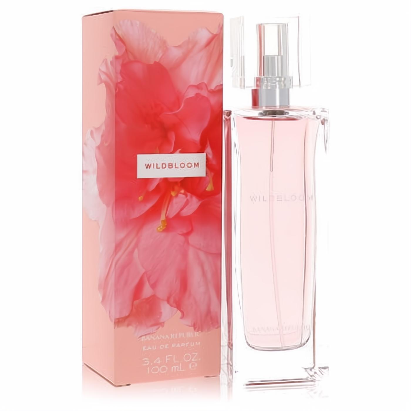 Unveil Banana Republic Wildbloom 3.4 oz EDP. Chic clear bottle with delicate pink perfume, presented with a stunning floral pink box.