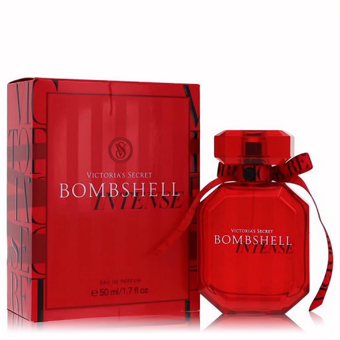 Victoria's Secret Bombshell Intense 1.7 oz EDP. Dazzling red faceted bottle with a chic branded ribbon, exuding allure.