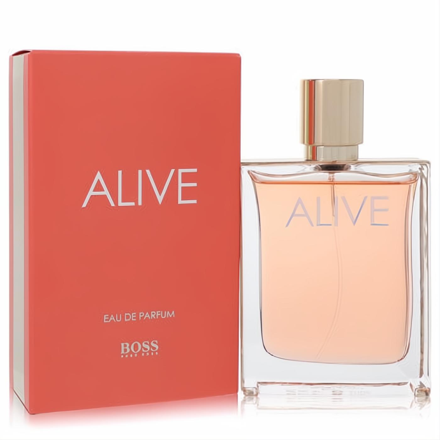 Boss Alive Eau De Parfum for women: Elegant clear glass bottle with warm peach fragrance, gold cap, and vibrant coral-orange box.