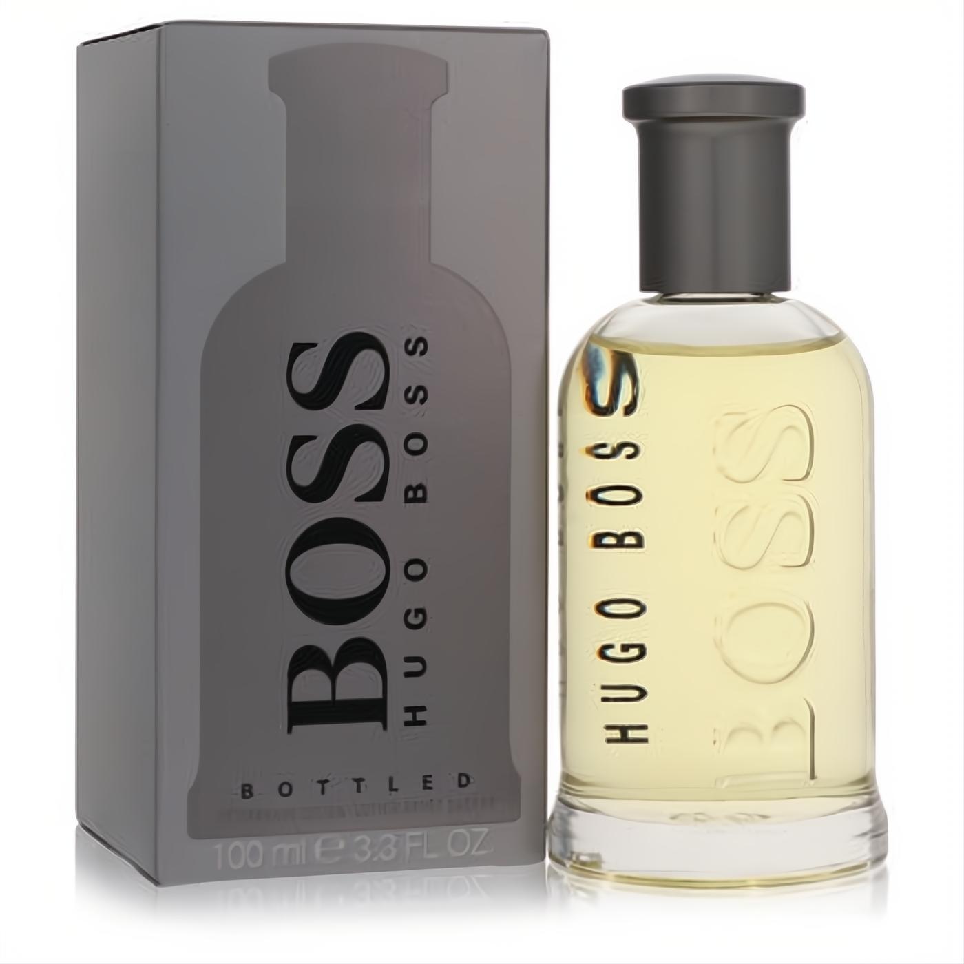 Boss Bottled Men's After Shave, 3.3 oz. Clear glass bottle with light yellow liquid, sleek grey cap, and elegant grey box.