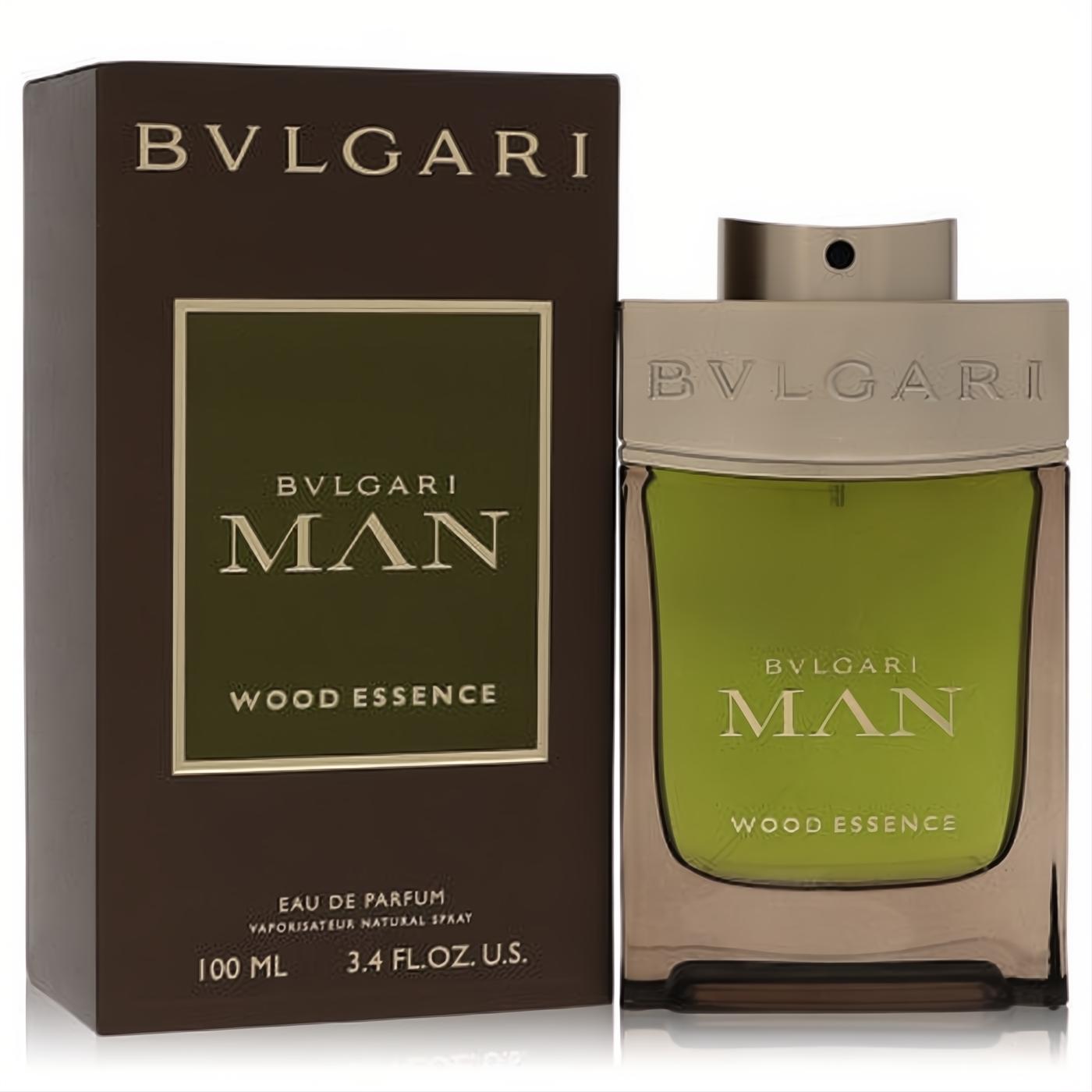 Bvlgari Man Wood Essence 3.4 oz EDP. Sleek green glass bottle with a luxurious gold cap, presented with its elegant brown box.