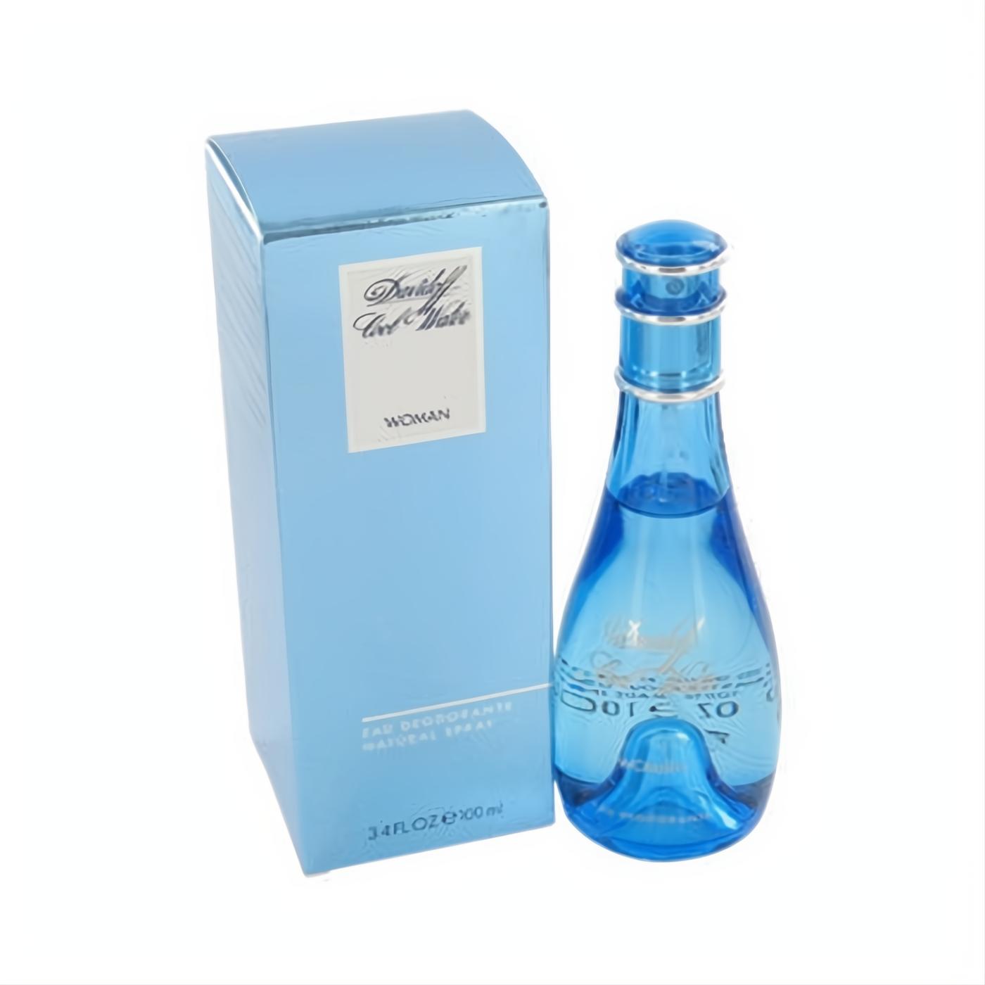 Davidoff Cool Water Woman 3.4 oz deodorant spray. Vibrant blue glass bottle with silver accents and matching light blue box.