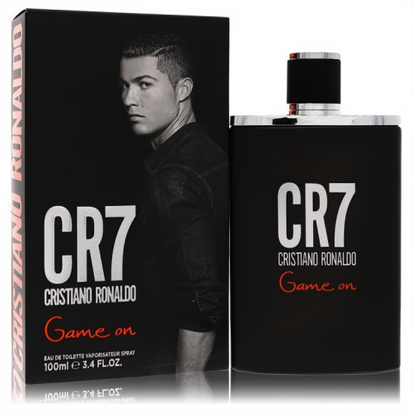 Sleek matte black CR7 Game On Eau De Toilette spray, 3.4 oz, with bold white and red text. Matching box shows Cristiano Ronaldo.