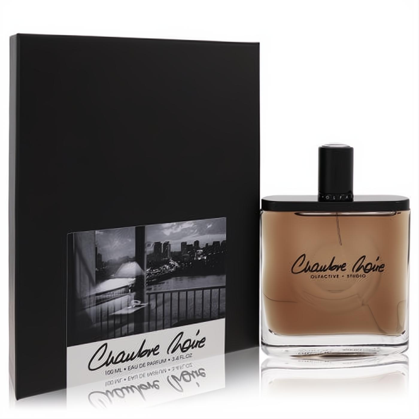 Sophisticated Olfactive Studio Chambre Noire 3.4 oz perfume. Clear glass bottle with warm brown liquid, black cap, and sleek black box.