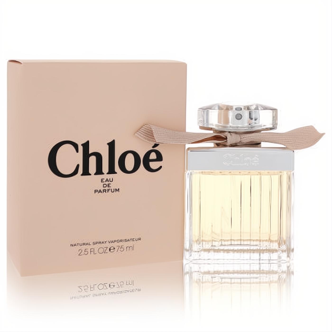Chloé Eau De Parfum 2.5 oz spray, featuring a clear ridged bottle with a nude ribbon, beside its chic blush pink box.
