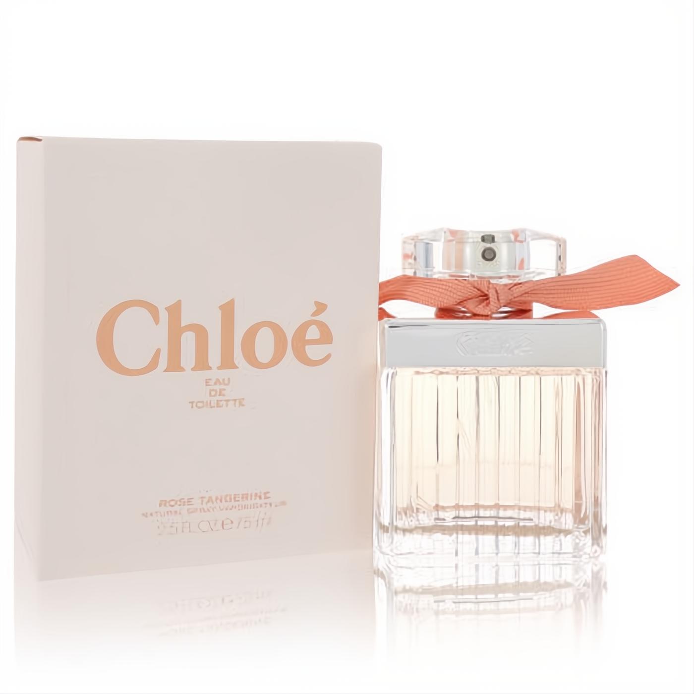 Chloé Rose Tangerine 2.5 oz Eau De Toilette. Elegant clear ribbed bottle with a chic peach ribbon, beside its matching soft pink box.