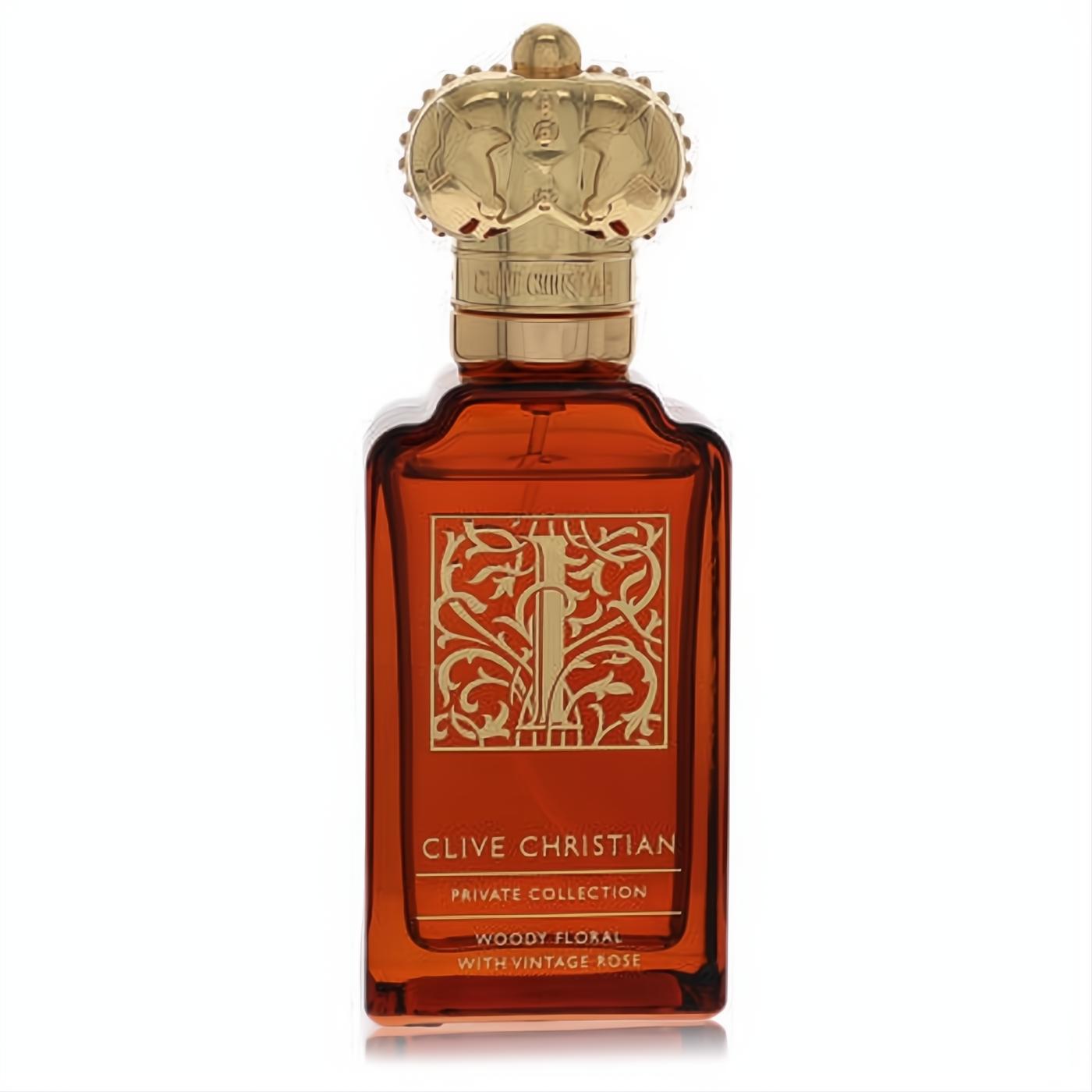 Clive Christian I Woody Floral With Vintage Rose EDP spray in a luxurious amber bottle with a regal gold crown cap.