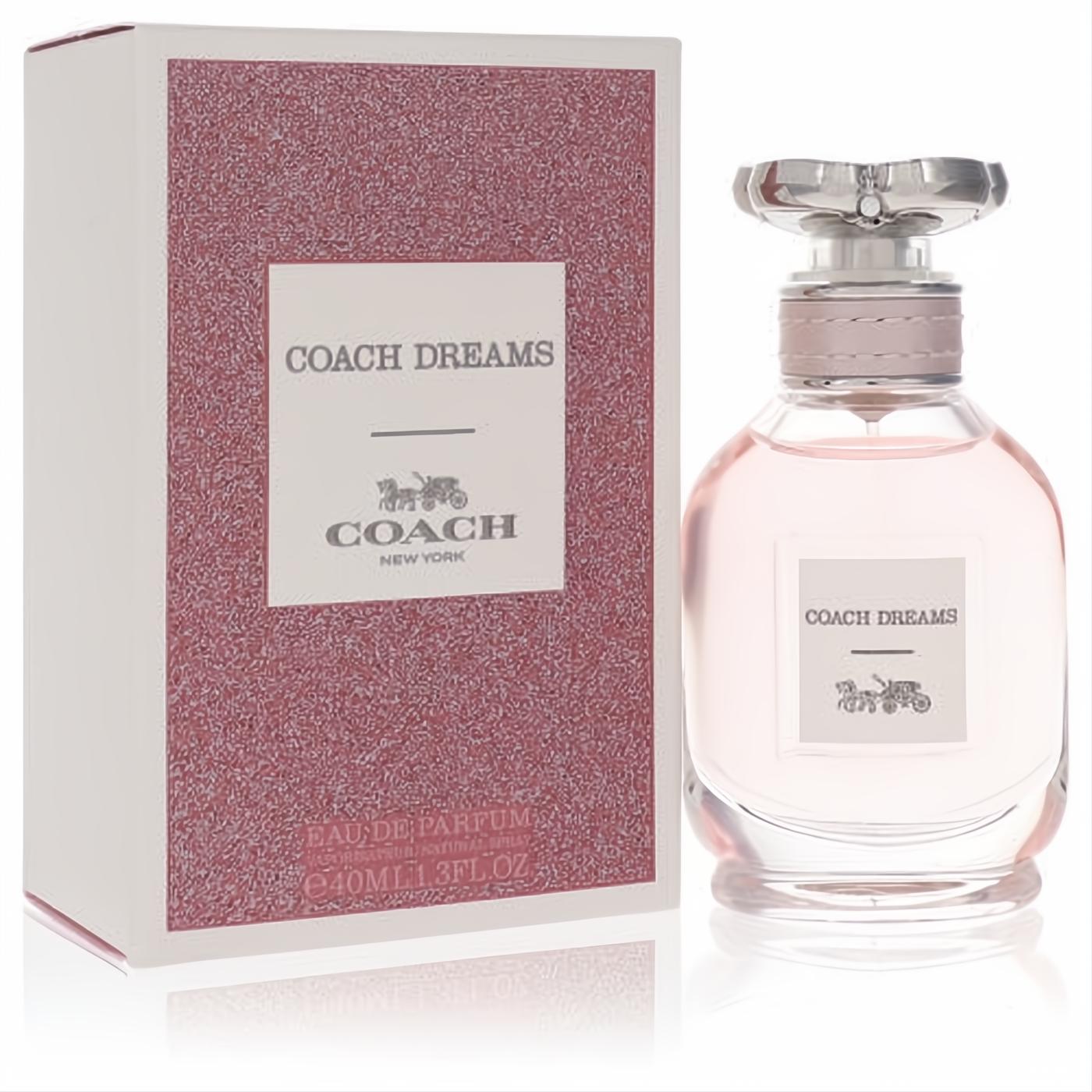Coach Dreams 1.3 oz Eau De Parfum. Exquisite clear bottle with soft pink fragrance, silver floral cap, and textured pink box.