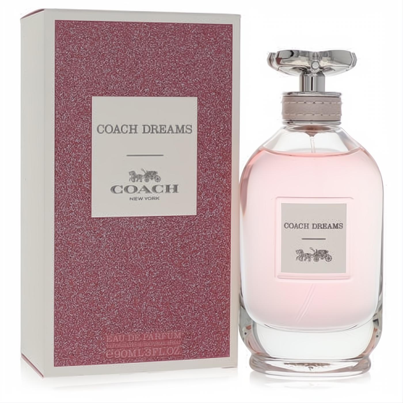 Elegant Coach Dreams 3 oz Eau De Parfum spray for women, with a clear pink bottle, silver floral cap, and matching textured box.