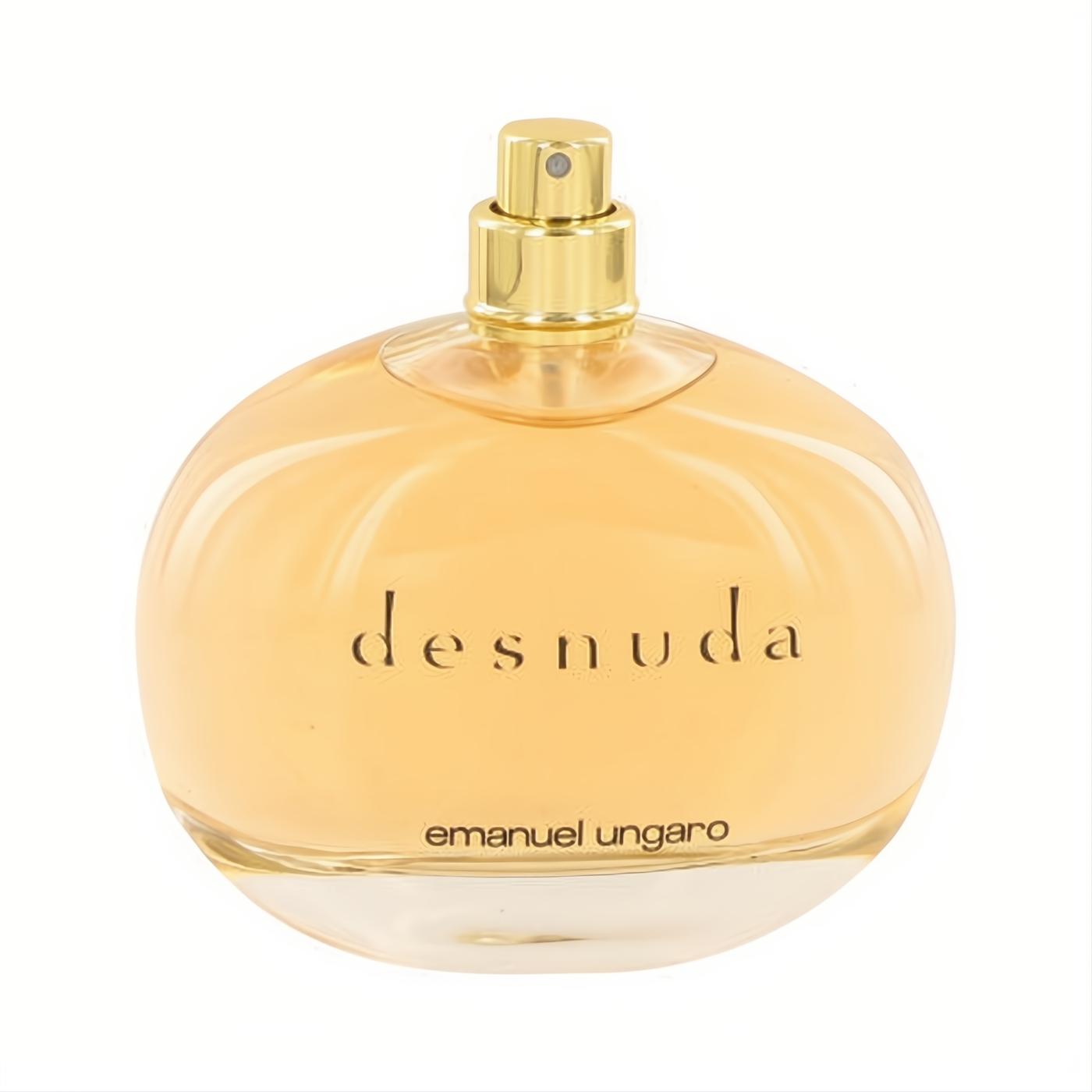 Elegant Desnuda by Ungaro 3.4 oz EDP tester. Clear round glass bottle with warm amber liquid and luxurious gold sprayer.