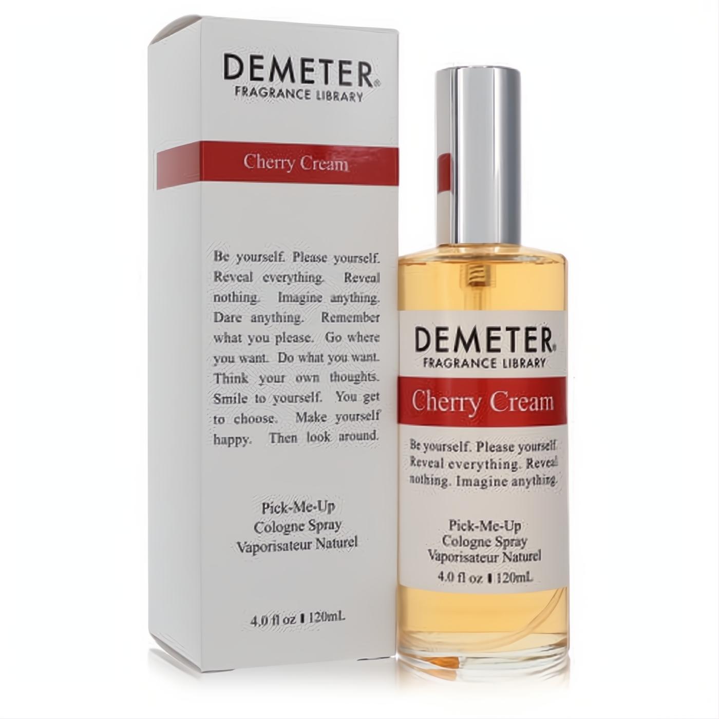 Demeter Cherry Cream 4 oz unisex cologne spray, a clear bottle with amber liquid and silver cap, beside its white and red branded box.