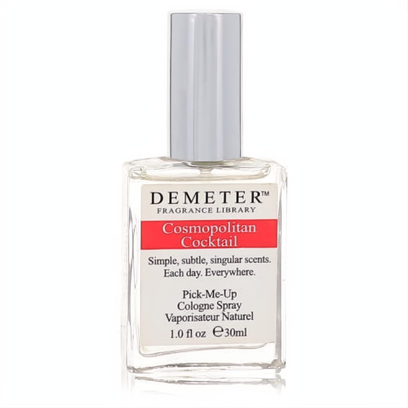 Demeter Cosmopolitan Cocktail 1 oz cologne spray. Clear glass bottle, sleek silver cap, vibrant red label.