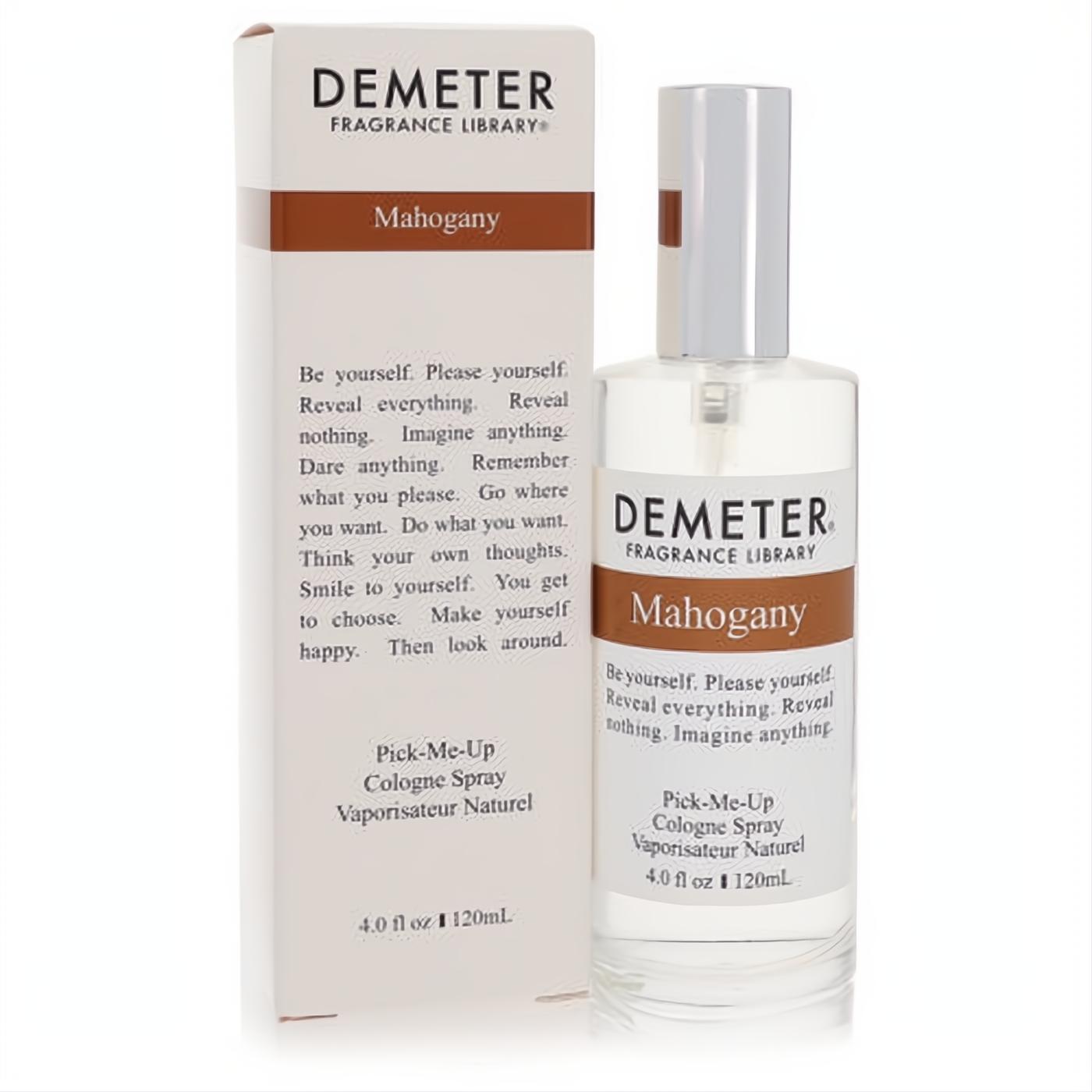 Demeter Mahogany 4 oz cologne spray. Sleek clear glass bottle with silver cap and crisp white box, accented by rich brown branding.