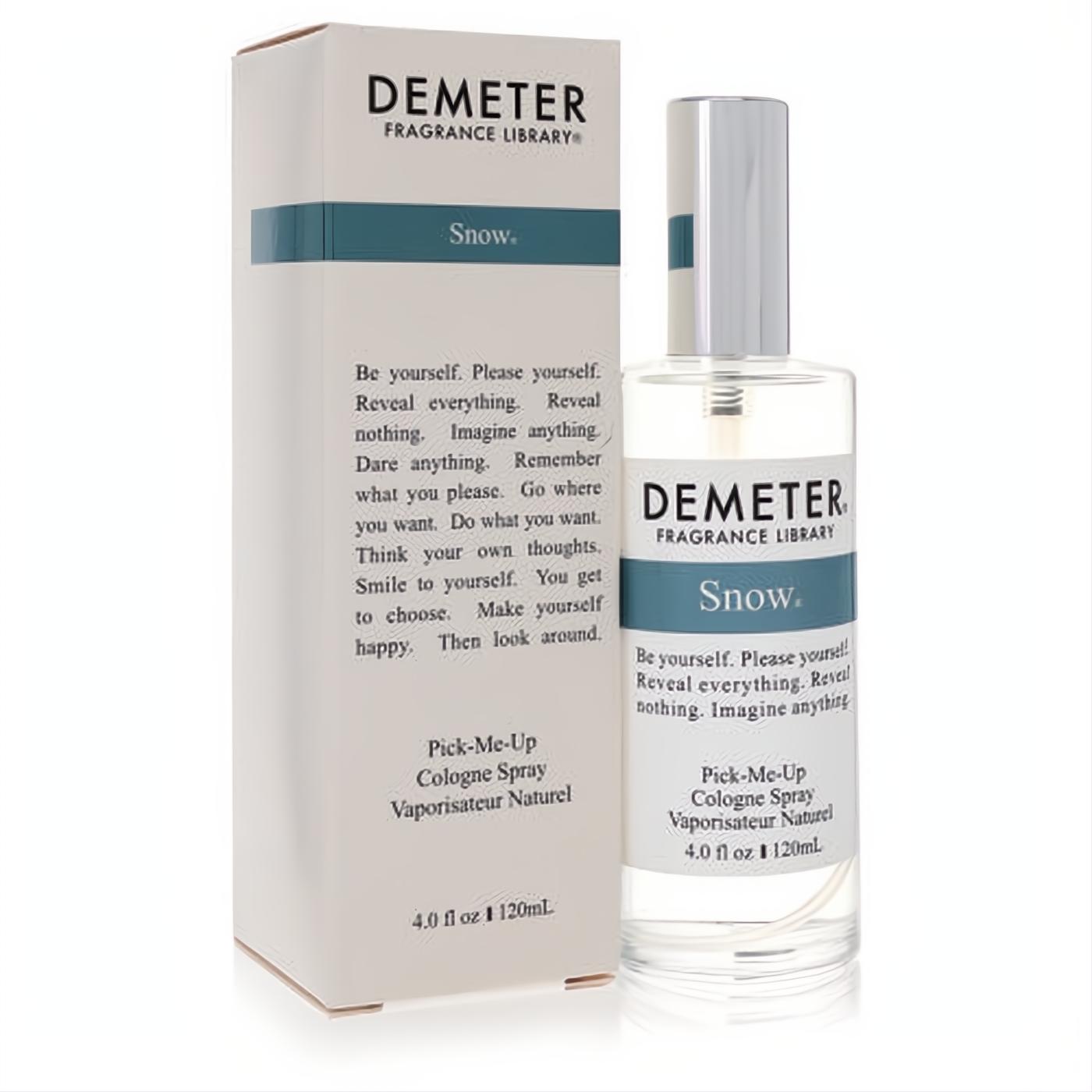 Demeter Snow 4 oz cologne spray, a clear glass bottle with silver cap and teal label, displayed elegantly next to its matching white box.