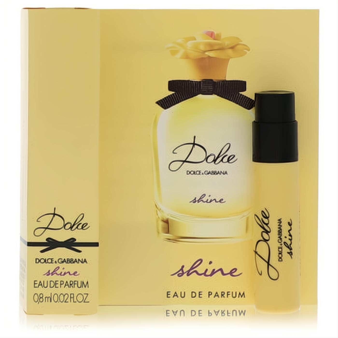Bright yellow Dolce & Gabbana Dolce Shine 0.02 oz women's perfume sample vial and elegant box. Discover this sweet fragrance.