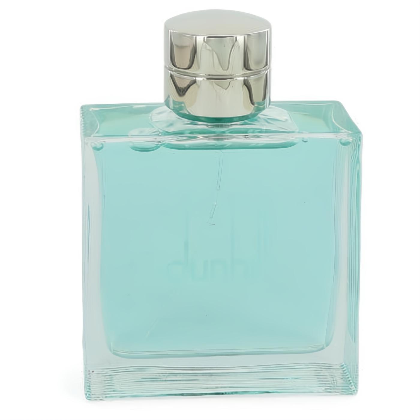 Dunhill Fresh men's EDT in a sleek, square clear glass bottle with refreshing blue fragrance and a silver cap.
