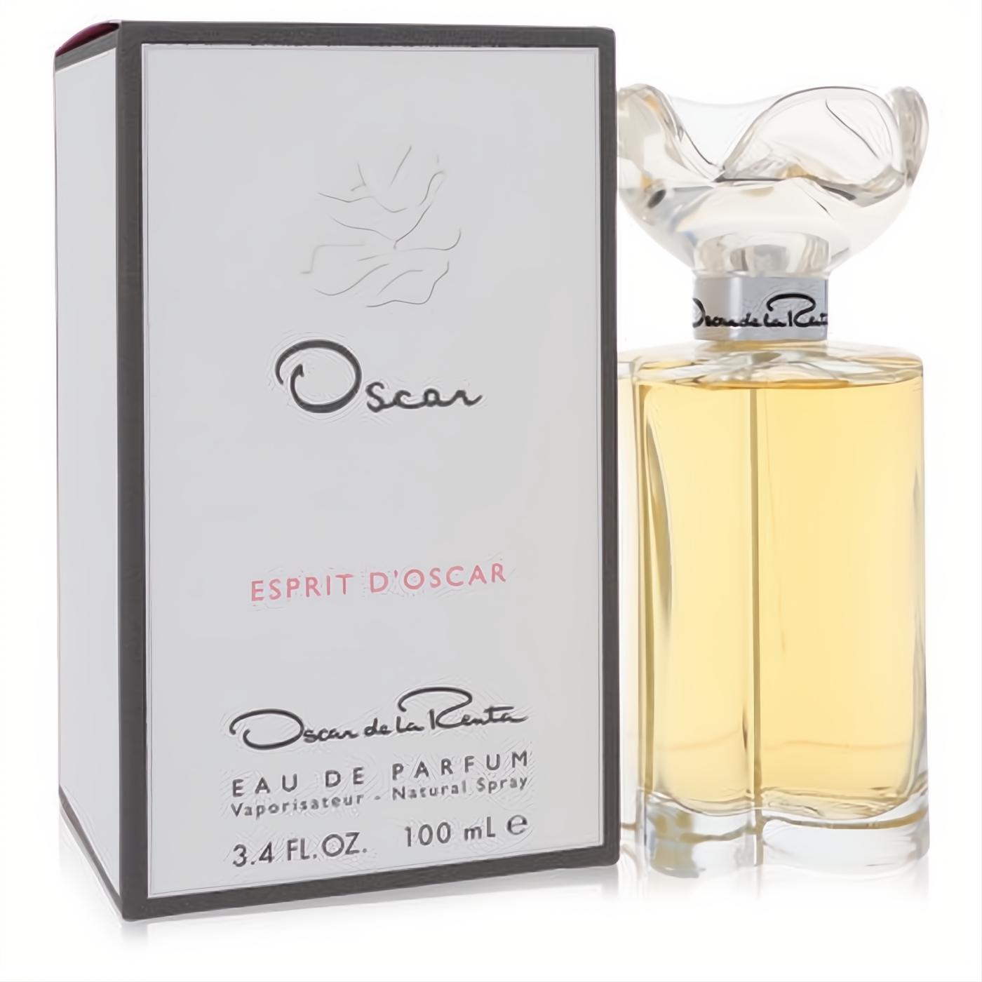 Luxurious Esprit d'Oscar 3.4 oz EDP by Oscar de la Renta. Golden fragrance in a clear bottle with a floral cap, beside its elegant white box.