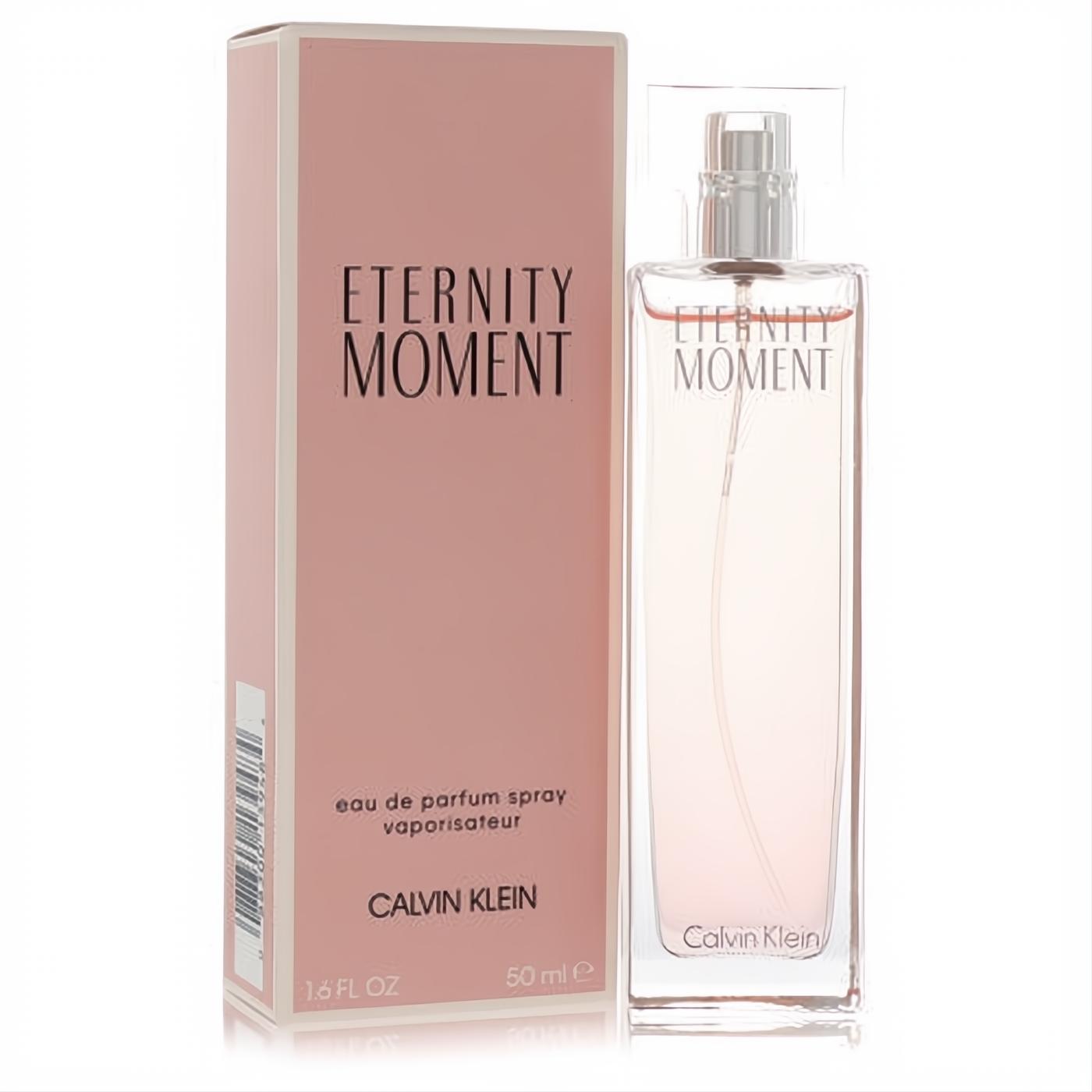 Elegant Eternity Moment Calvin Klein 50ml EDP spray, clear glass bottle with silver top, beside its blush pink box.