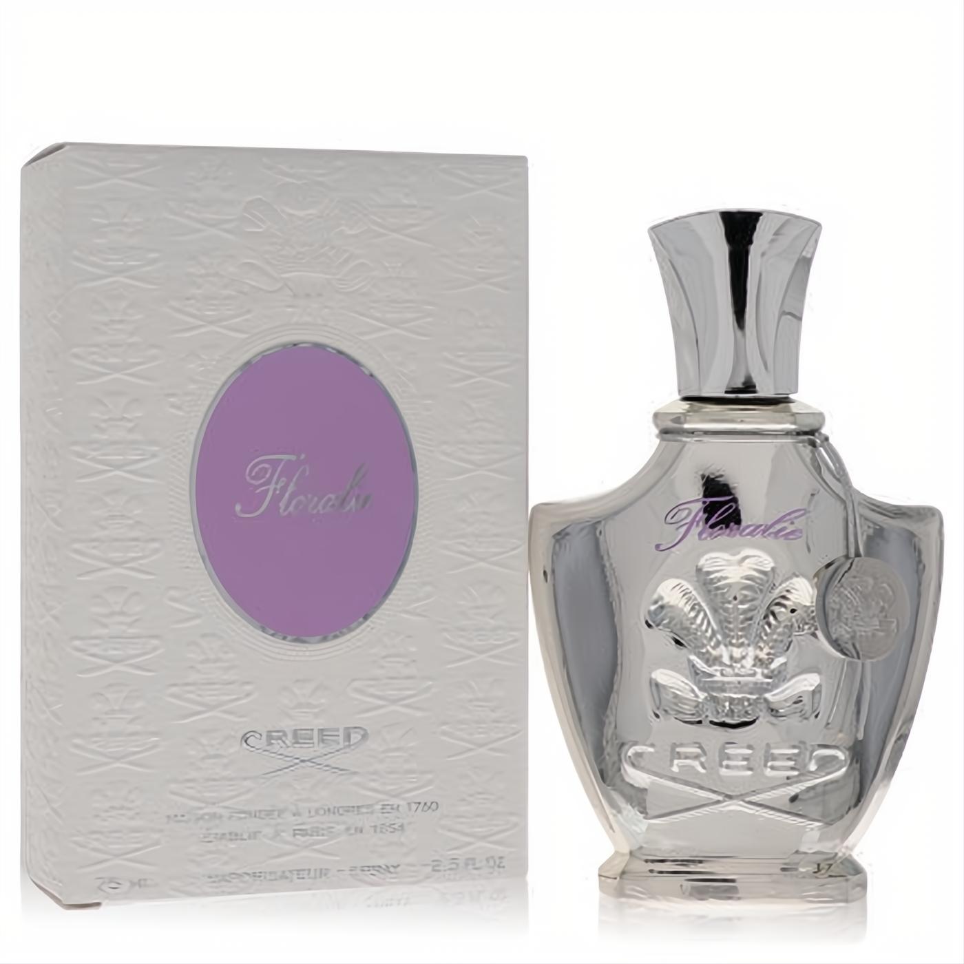 Luxurious Creed Floralie 2.5 oz women's EDP. Features a stunning silver ornate bottle with purple script and a matching white embossed box.