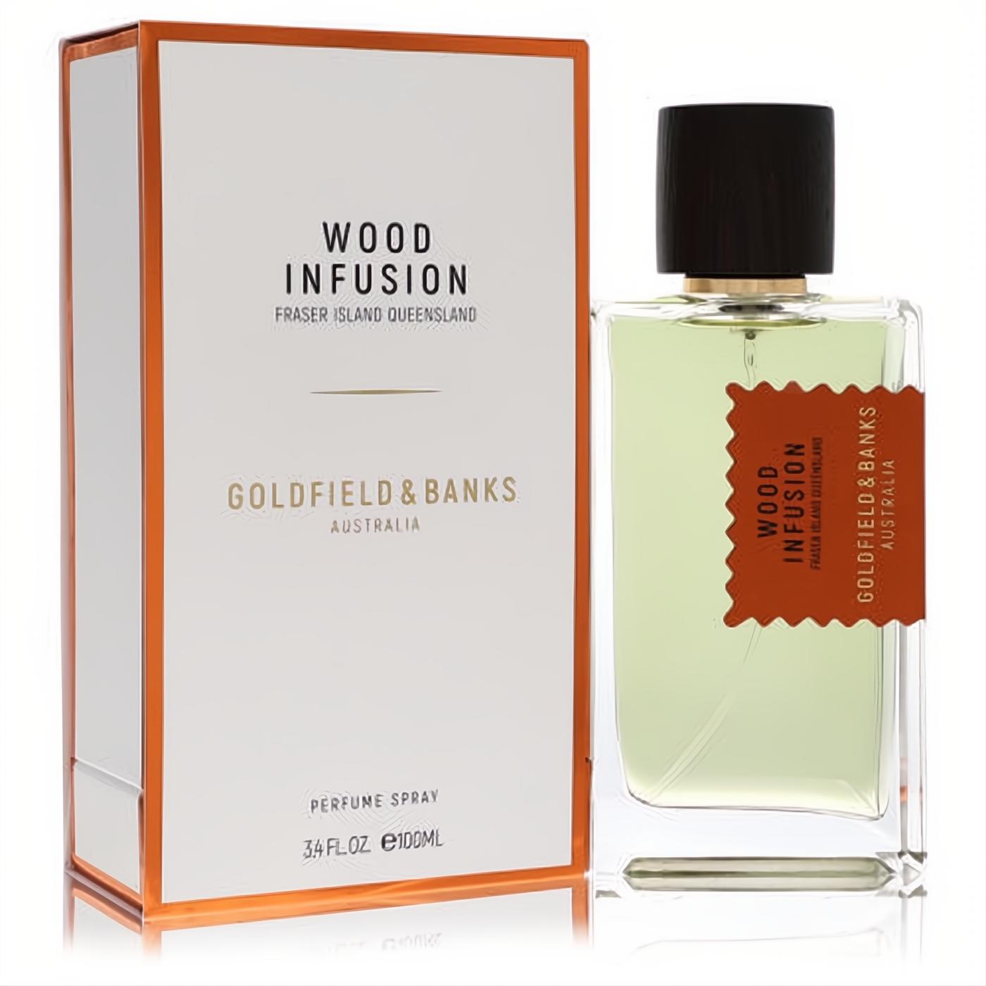 Goldfield & Banks Wood Infusion 3.4 oz unisex perfume spray. Clear bottle with pale green liquid, black cap, and signature orange label, beside its elegant white and orange box.