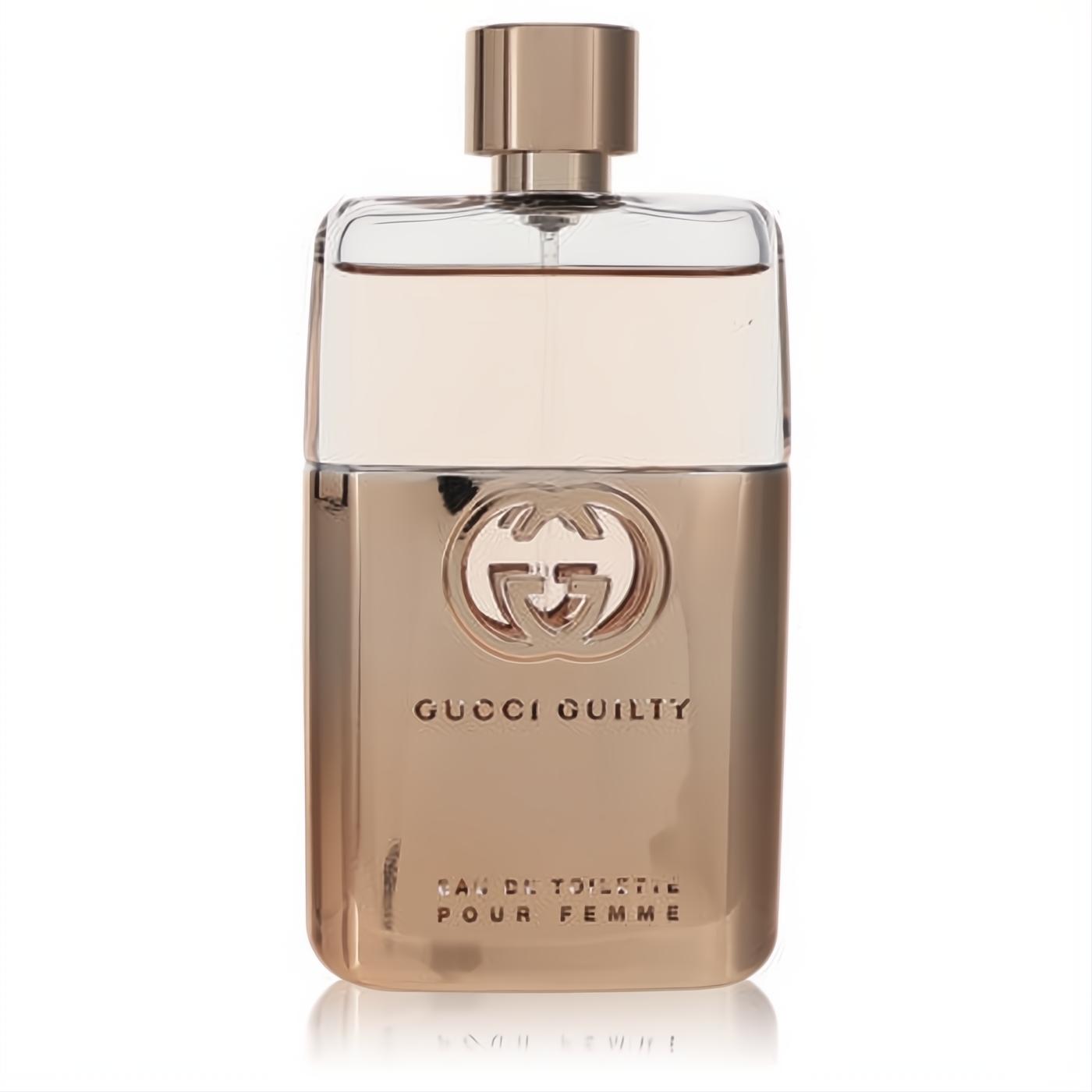 Gucci Guilty Pour Femme Eau De Toilette spray. Luxurious rose gold metallic bottle with the iconic GG logo.