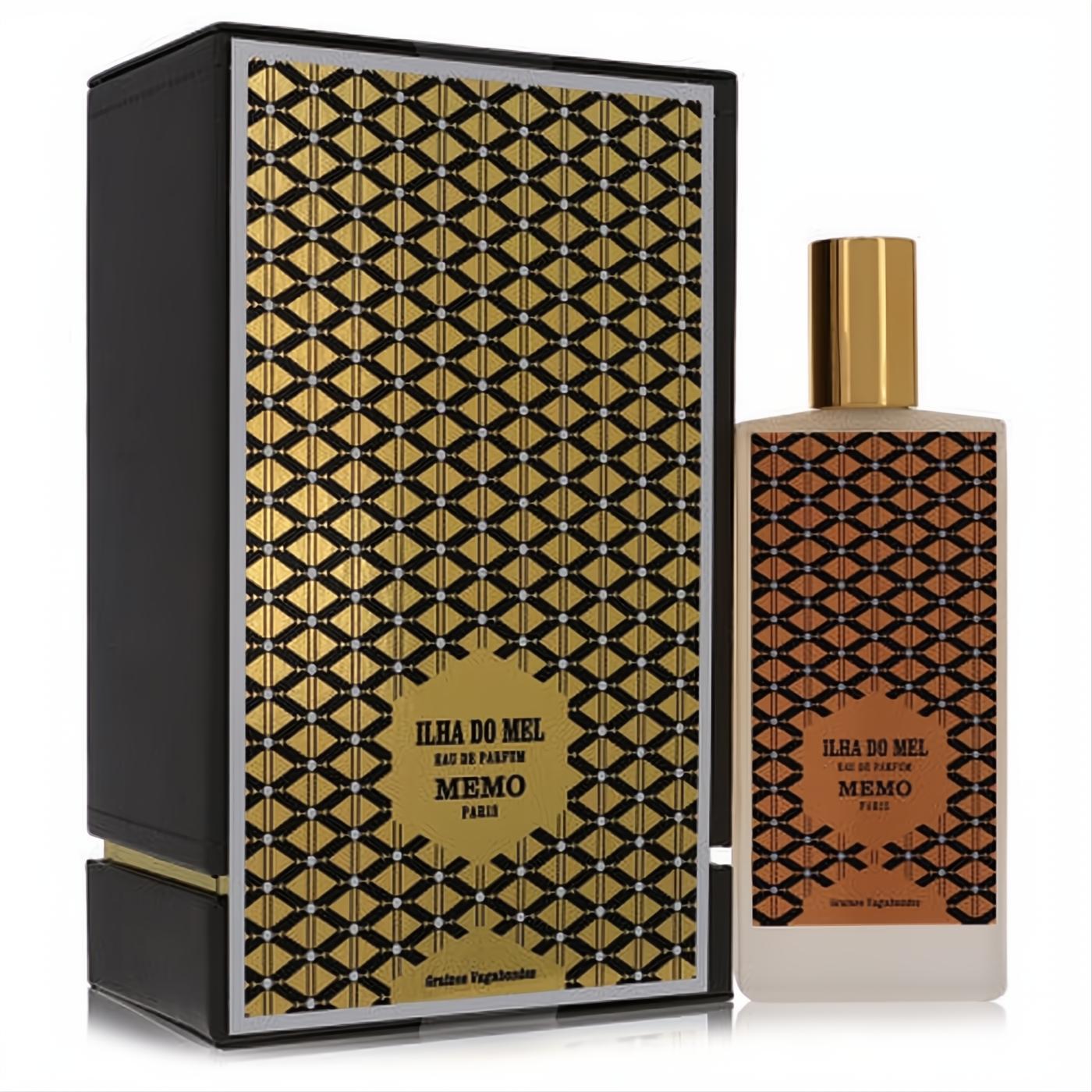 Ilha Do Mel Memo Paris 2.5 oz unisex EDP. Elegant frosted bottle with gold cap & geometric pattern, next to its luxurious black and gold box.
