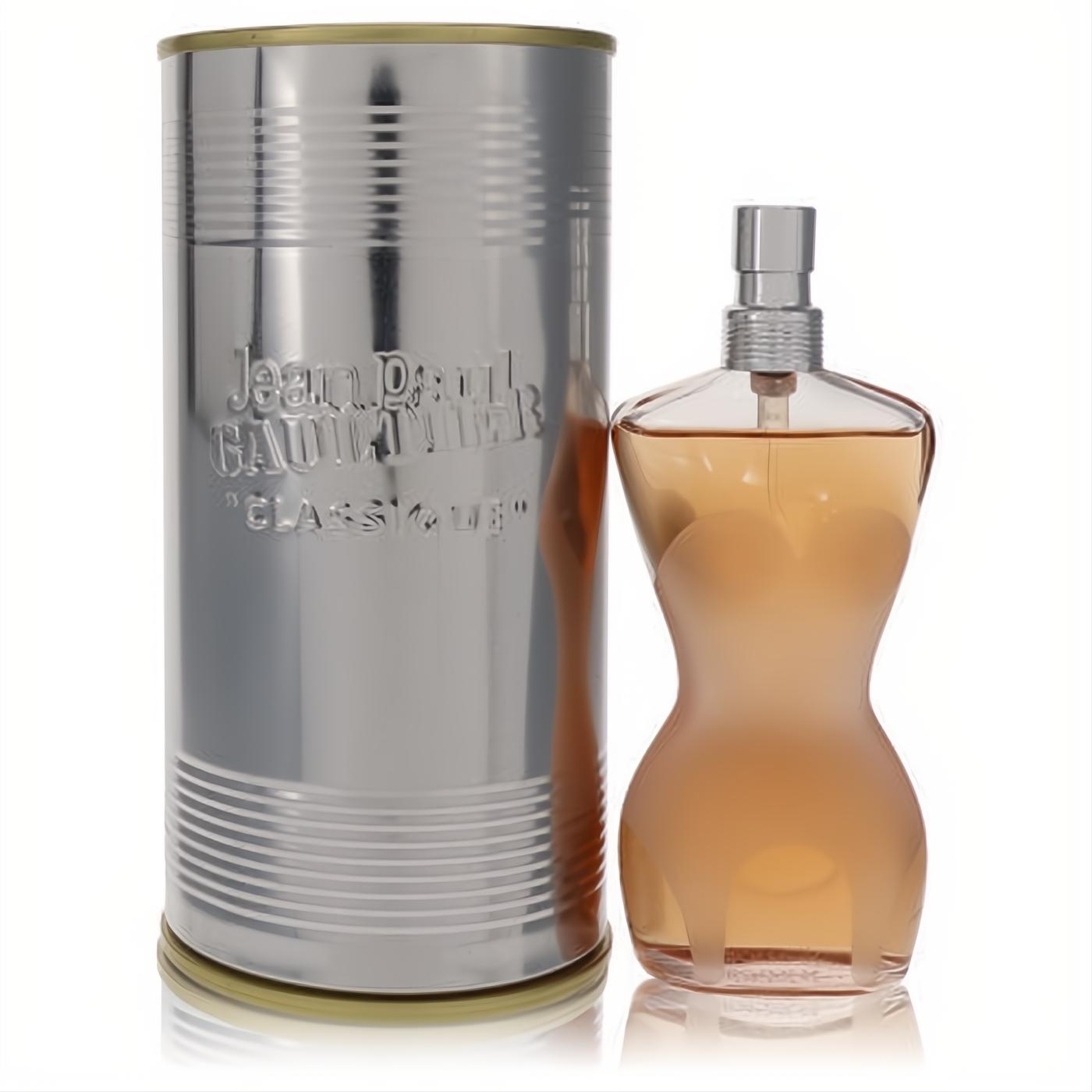 Jean Paul Gaultier Classique perfume in a frosted amber female torso bottle with a sleek silver ribbed can.