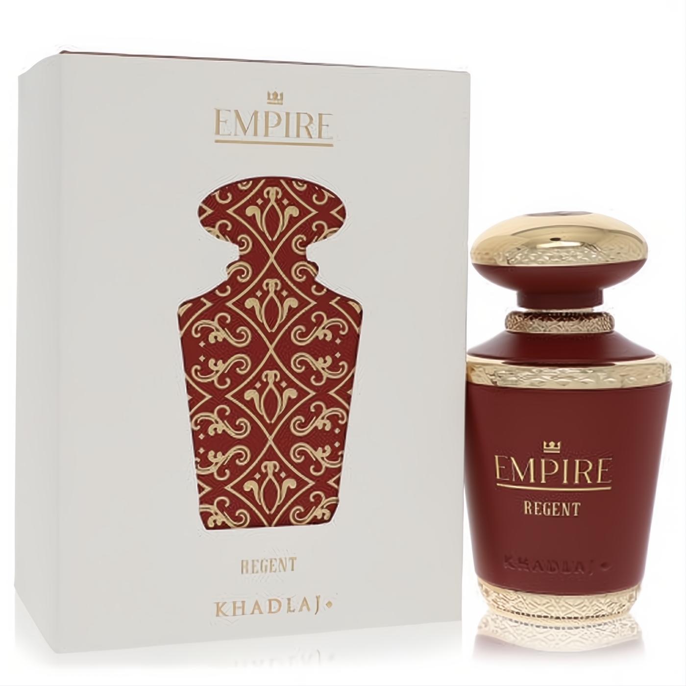 Khadlaj Empire Regent 3.4 oz EDP. Luxurious red and gold bottle with elegant cap, displayed with its cream box featuring intricate gold patterns.