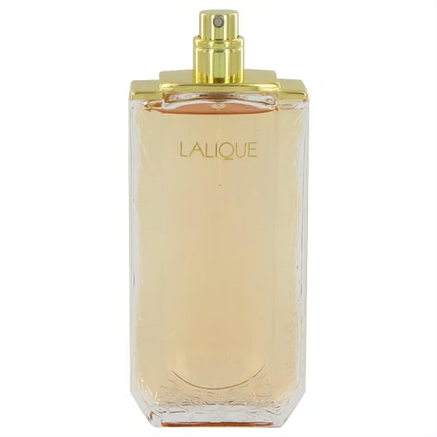 Lalique women's Eau De Parfum spray in a sleek clear glass bottle with a luxurious gold top, showcasing the warm amber scent.