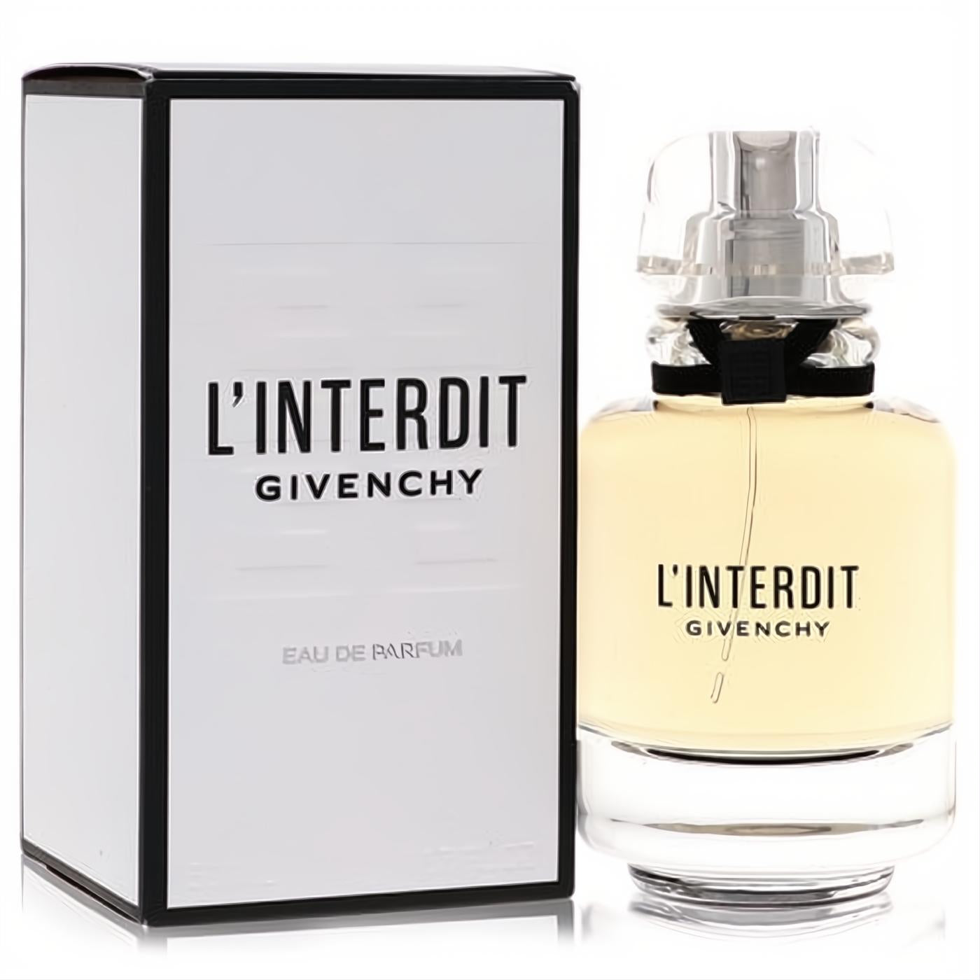 Experience L'Interdit Givenchy Eau De Parfum. Clear glass bottle with black ribbon, elegant faceted cap, and white box.