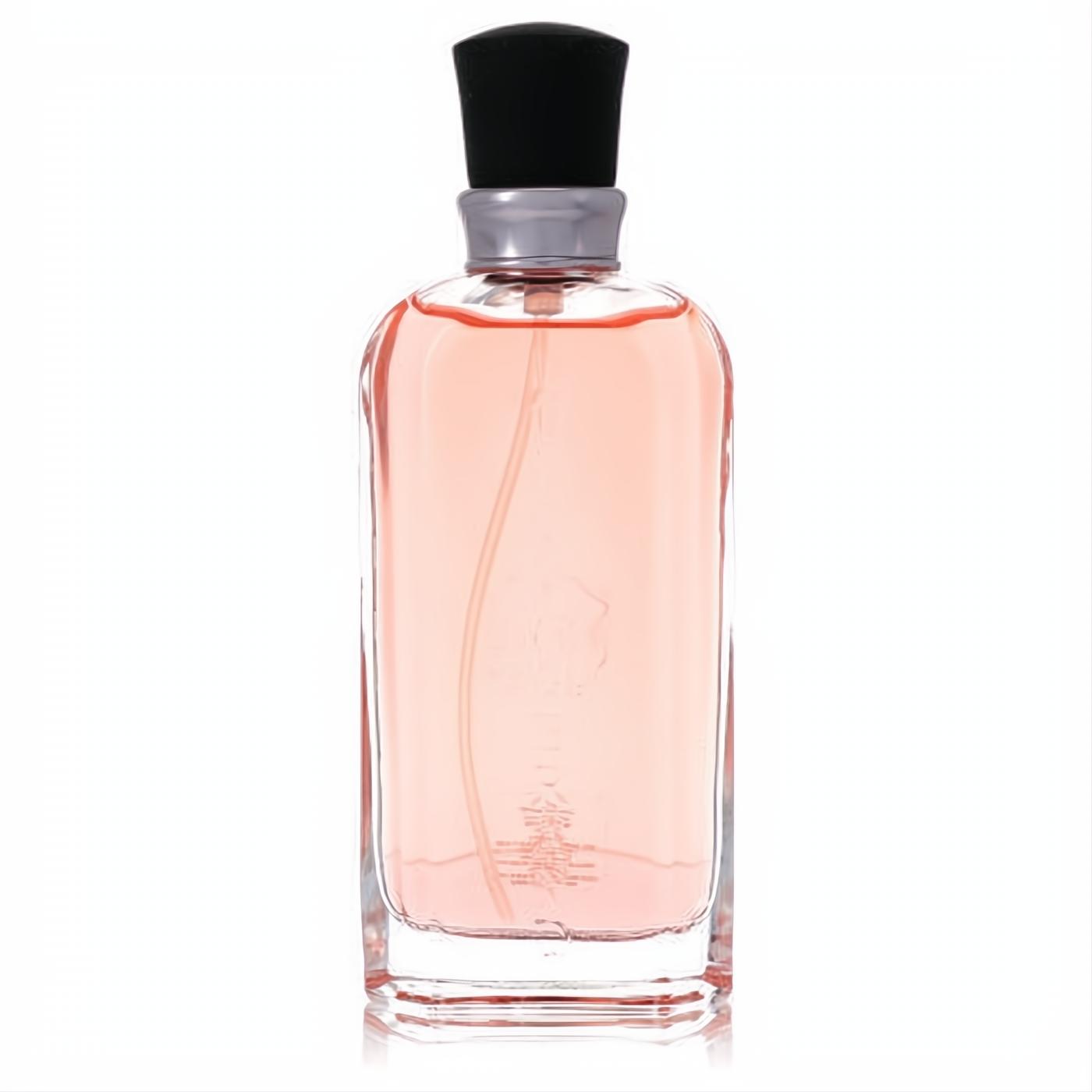 Lucky You Liz Claiborne women's Eau De Toilette. Clear glass bottle with radiant peachy-pink fragrance and sleek black cap.