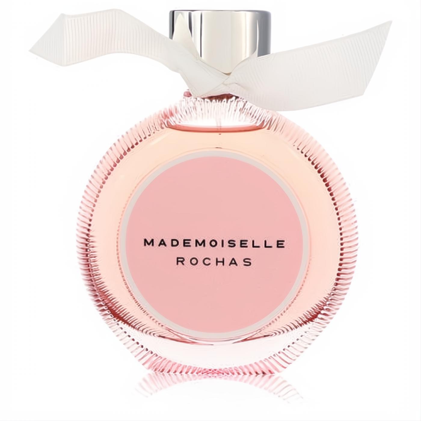 Elegant Mademoiselle Rochas 3 oz EDP tester. Round pink ribbed glass bottle with silver cap and white ribbon detail.