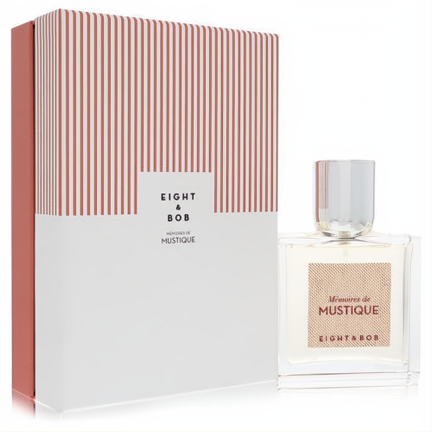 Sophisticated Eight & Bob Memoires de Mustique unisex EDP. Clear glass bottle, silver cap, and elegant white & red striped box.