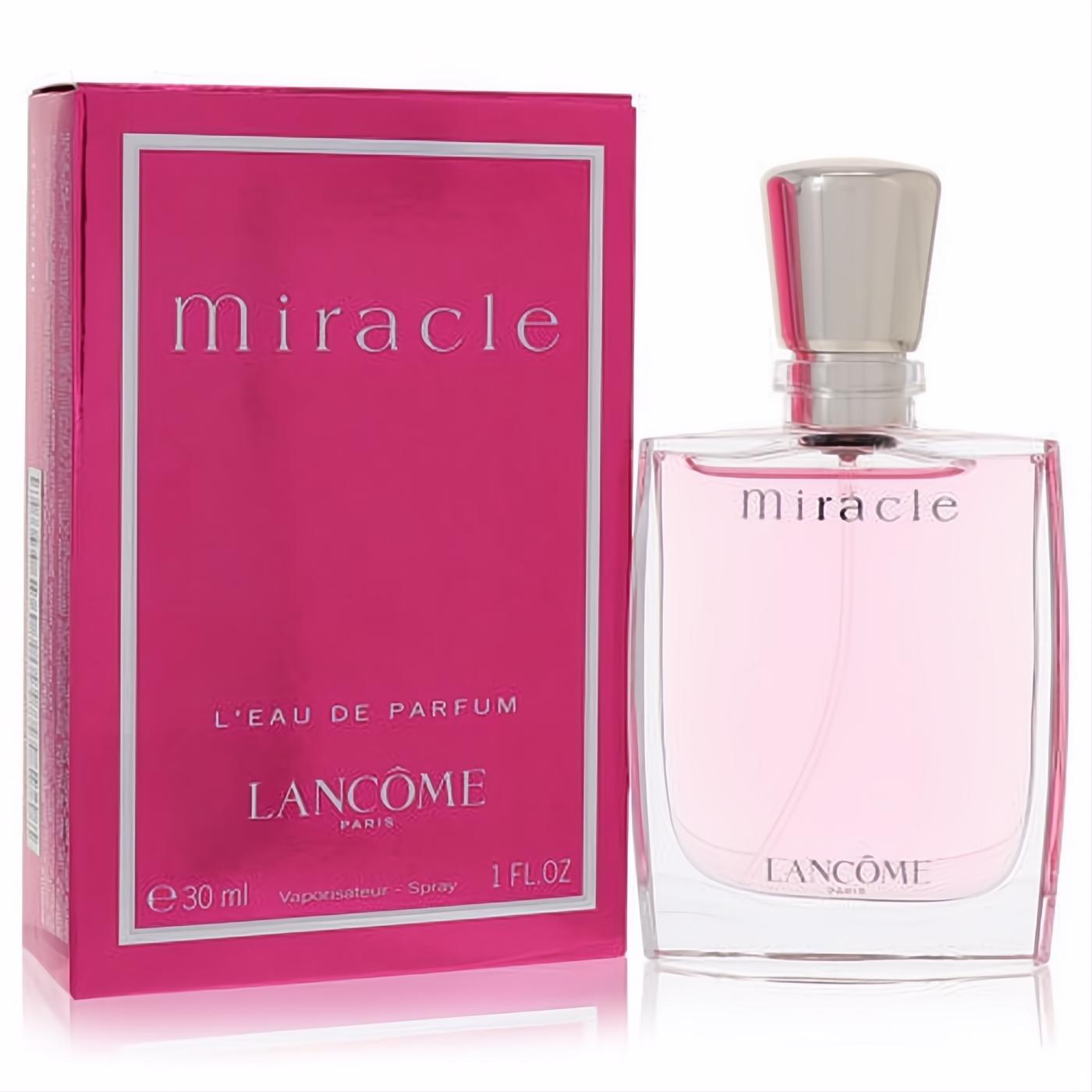 Lancome Miracle 1 oz Eau De Parfum spray. Vibrant pink box and elegant clear bottle with a sleek silver cap.