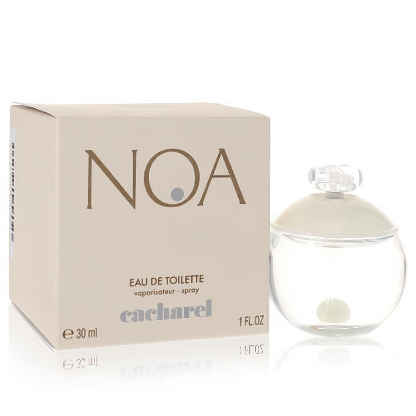 Elegant Cacharel Noa 1 oz women's EDT spray: clear glass bottle with pearl detail, beside its chic beige box.