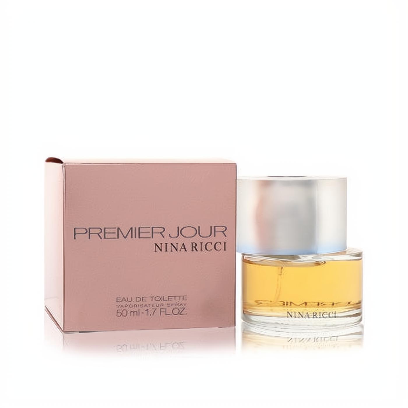 Premier Jour by Nina Ricci 1.7 oz EDT spray. Golden fragrance in a sleek clear bottle with silver cap and elegant rose gold box.